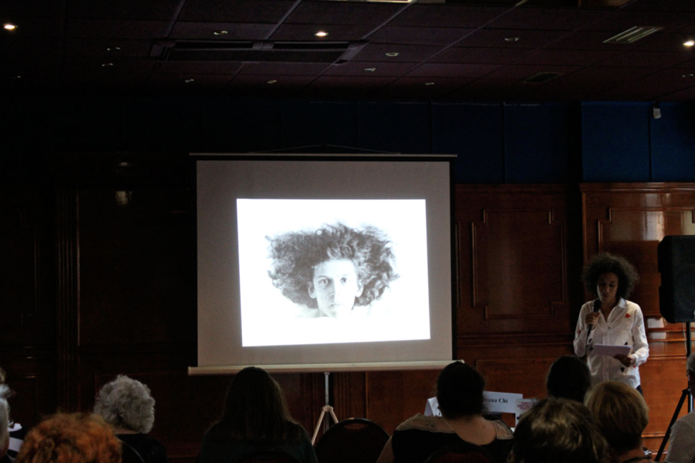  Figure 3. Layla Zami speaks in the lecture-performance Killjoy, Belgrade, 2019. Photo by Sonja Viličić.  