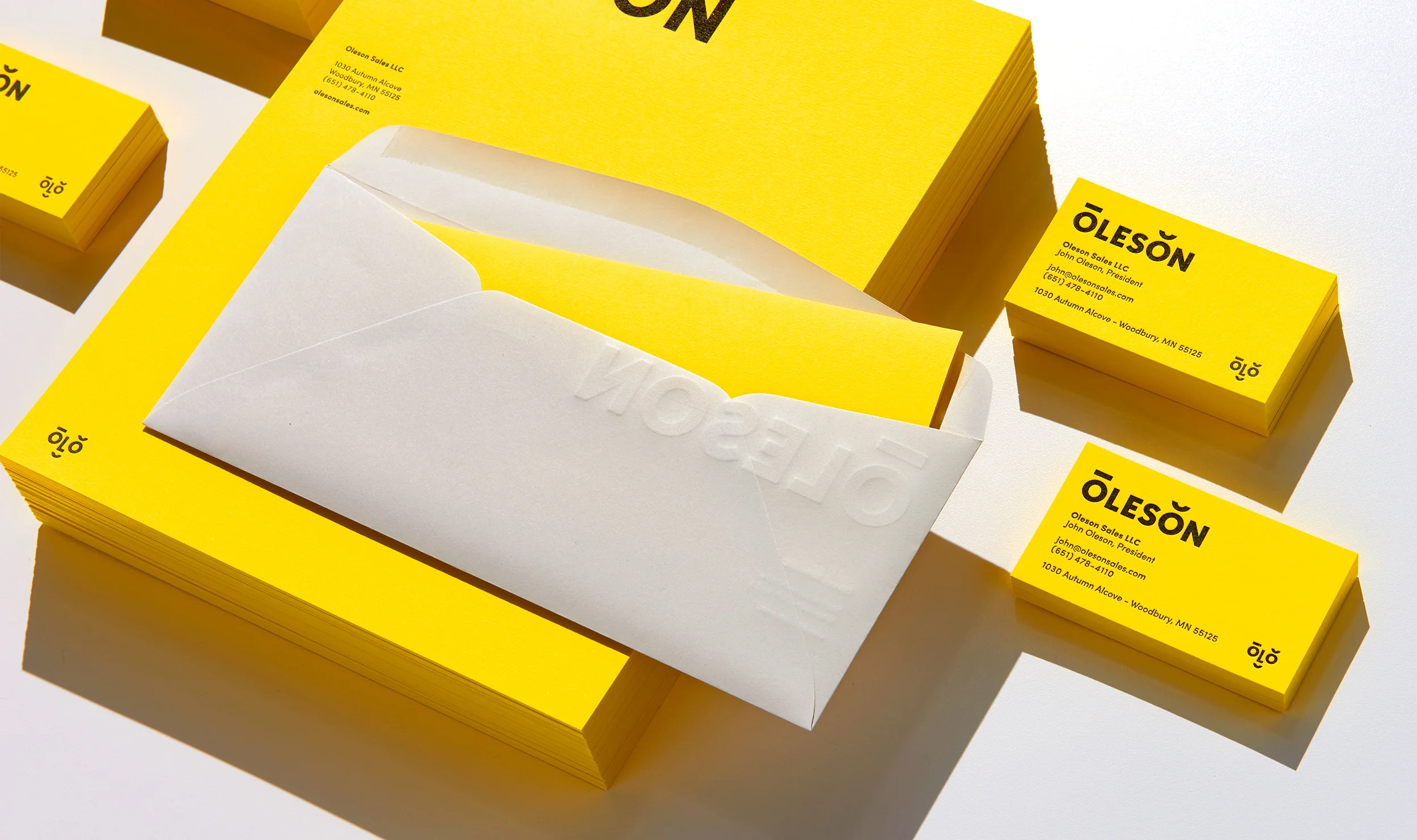 Oleson Sales identity designed by Abby Haddican at Werner Design Werks.
