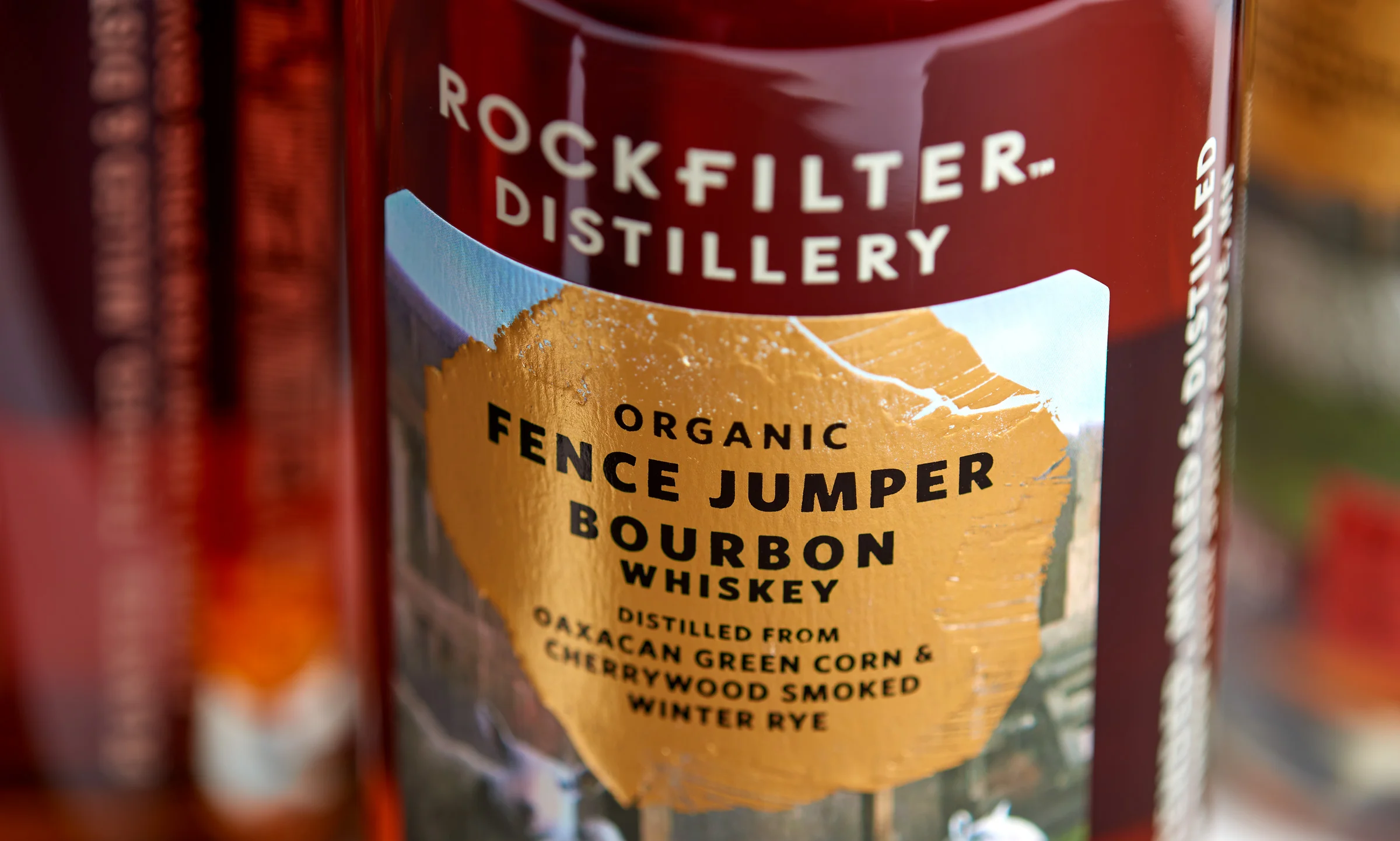 Detail of gold foil stamping on RockFilter Fence Jumper Bourbon whiskey. Designed by Abby Haddican and Sarah Forss at Werner Design Werks.