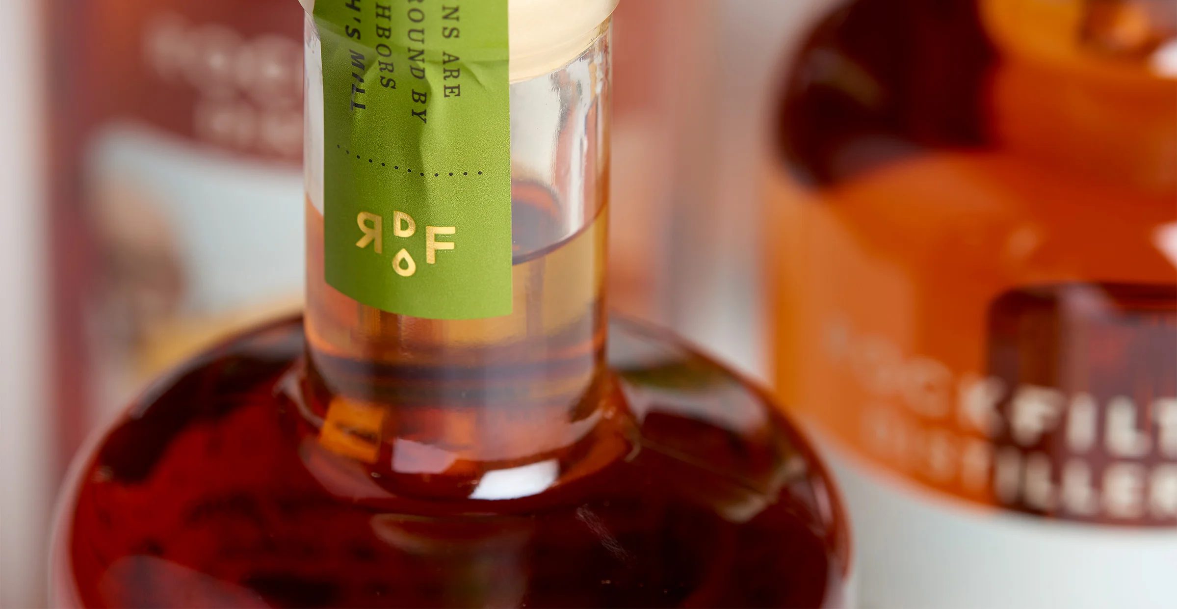 Neck detail, RockFilter Distillery Giants of the Earth bourbon. Designed by Abby Haddican and Sarah Forss at Werner Design Werks in Saint Paul, Minnesota.
