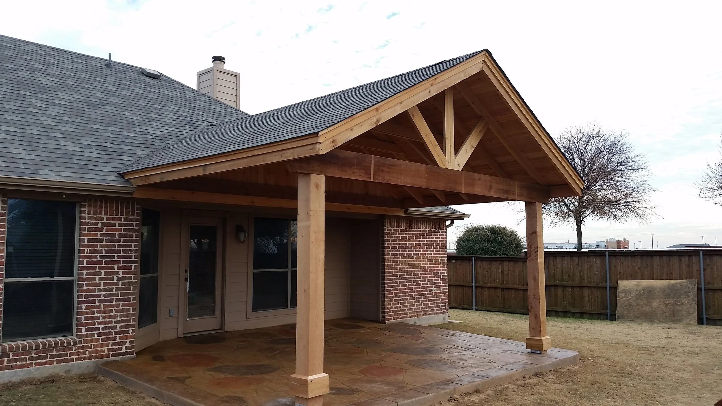 This beautiful gable style patio cover can easy be spotted from your vehicle on the East side of McCreary Rd just North of FM 544 in Wylie, TX