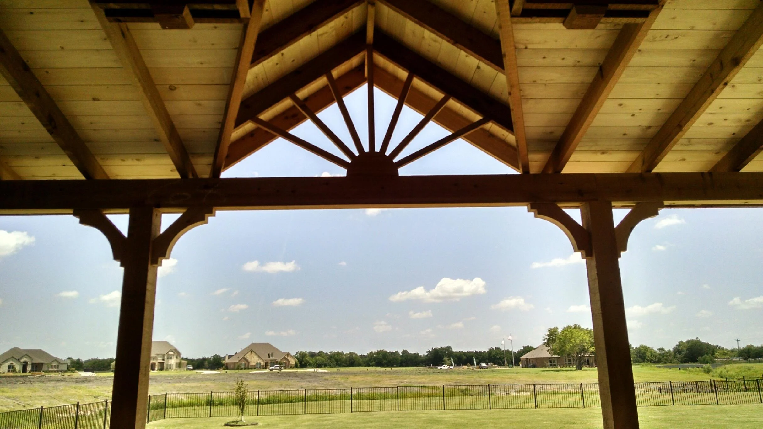 Beautiful view from underneath our shed style patio cover with optional gable. 100% Cedar Construction. Even the decking!