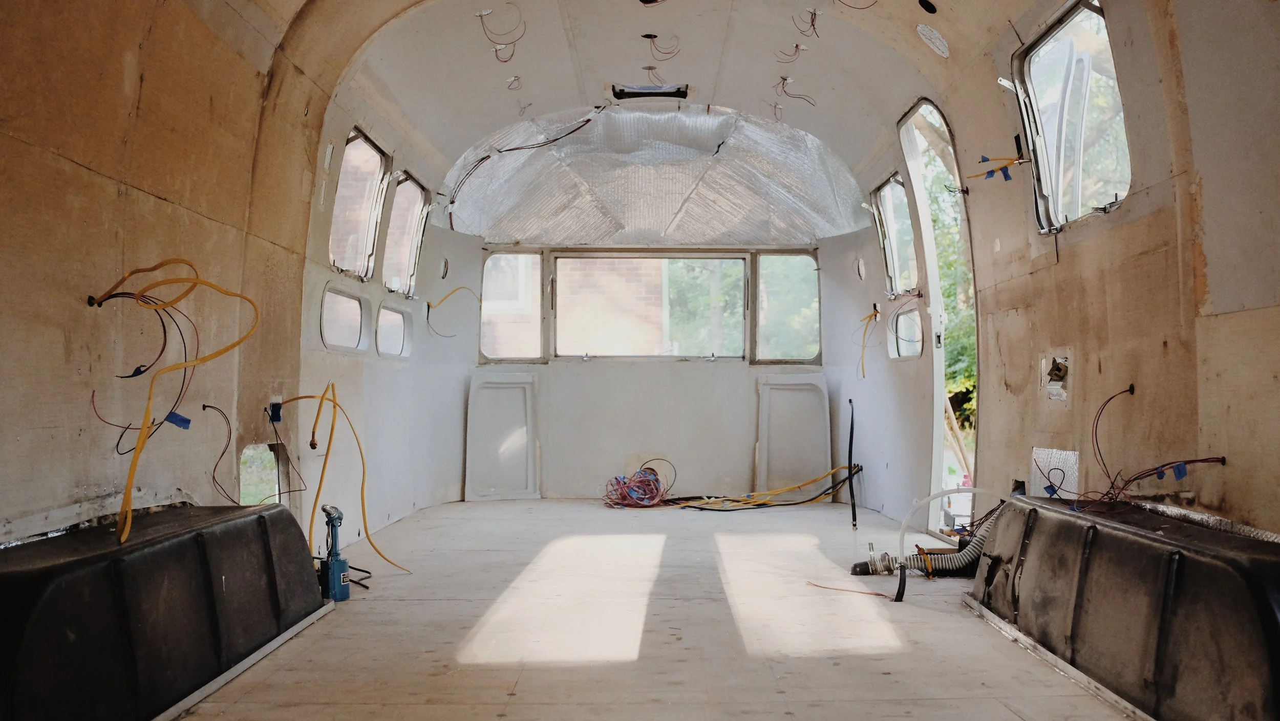 Last week, before we laid on that first coat of primer. We used Zinsser on this Airstream, but Kilz is just as good and we've used it in the past. We recommend both of these primers when painting over the skins with the existing vinyl for stain, grease cover-up and fantastic grip/stick. 