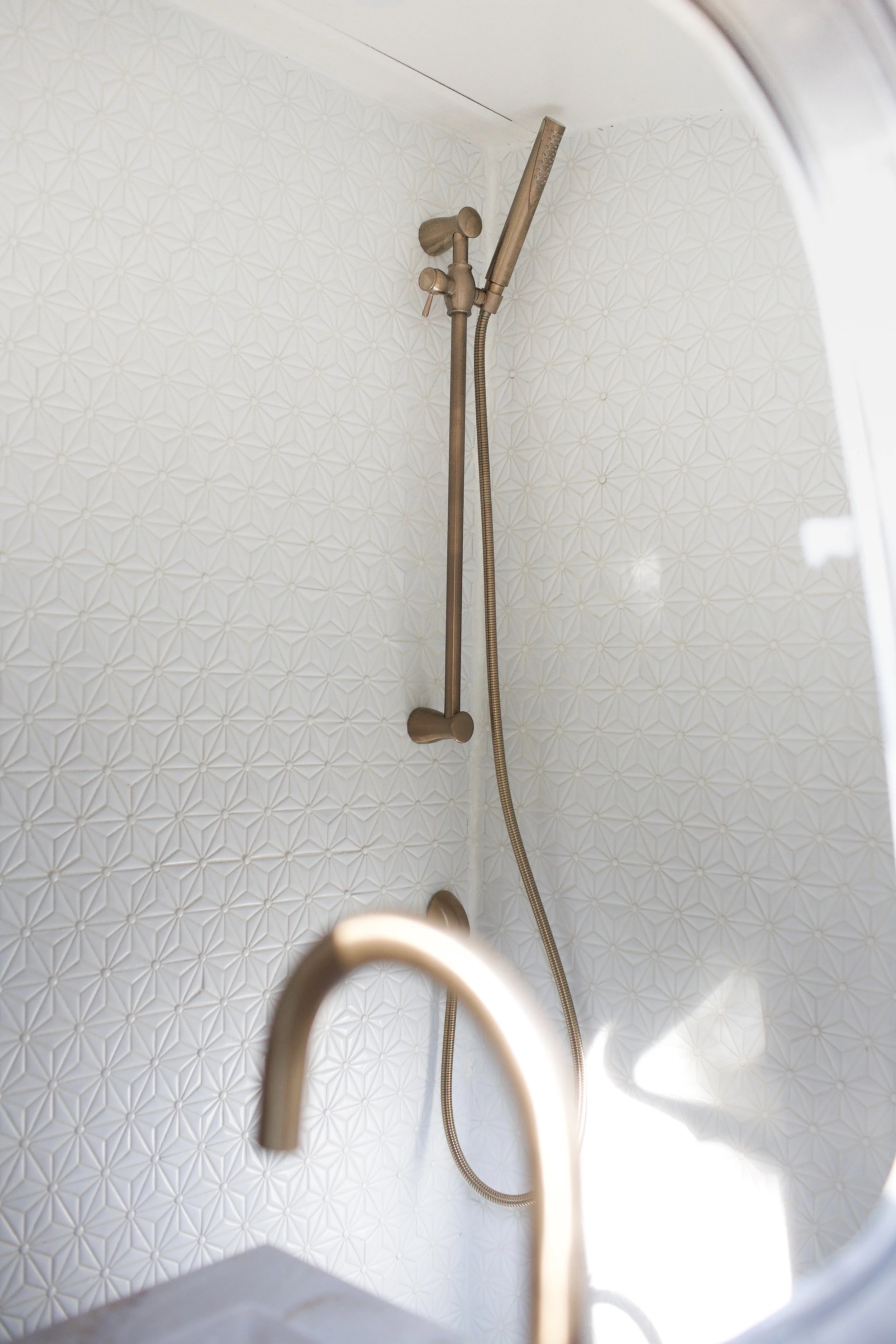 All the bathroom fixtures are from Delta, and are available right here on our resources page .