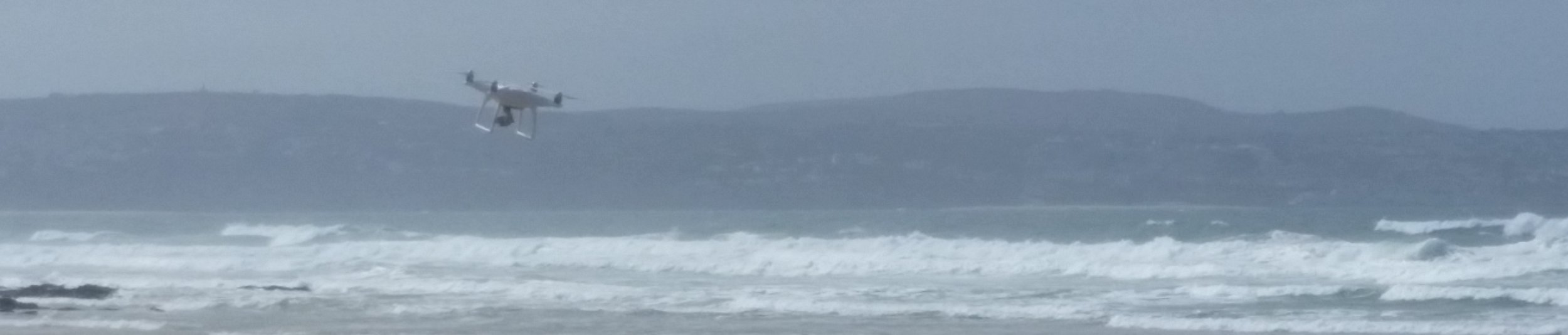 Drone against the elements at Gwithian Beach, Cornwall.