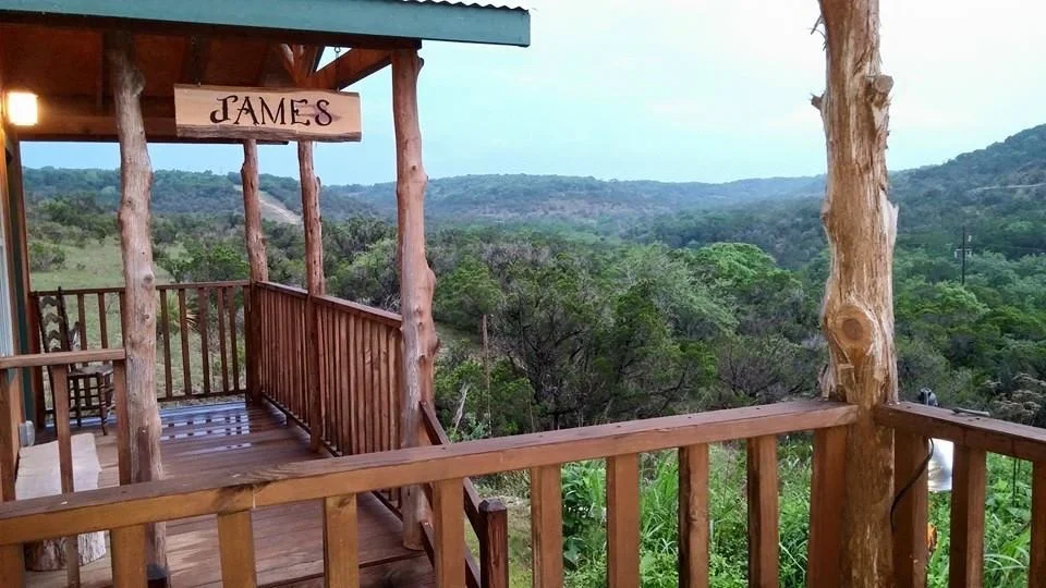 Each cabin has a spectacular view of the Wimberley valley. 