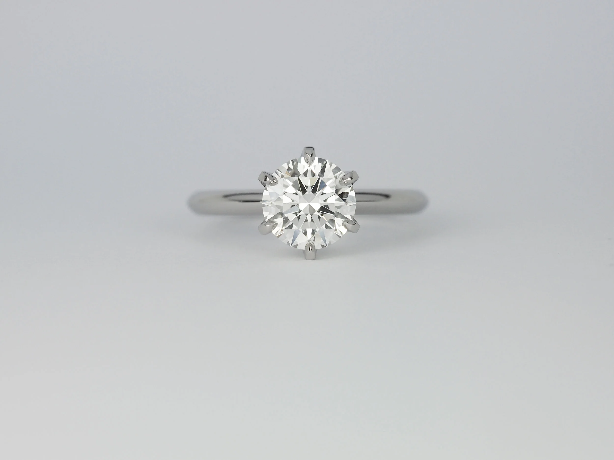 Six claw solitaire platinum engagement ring