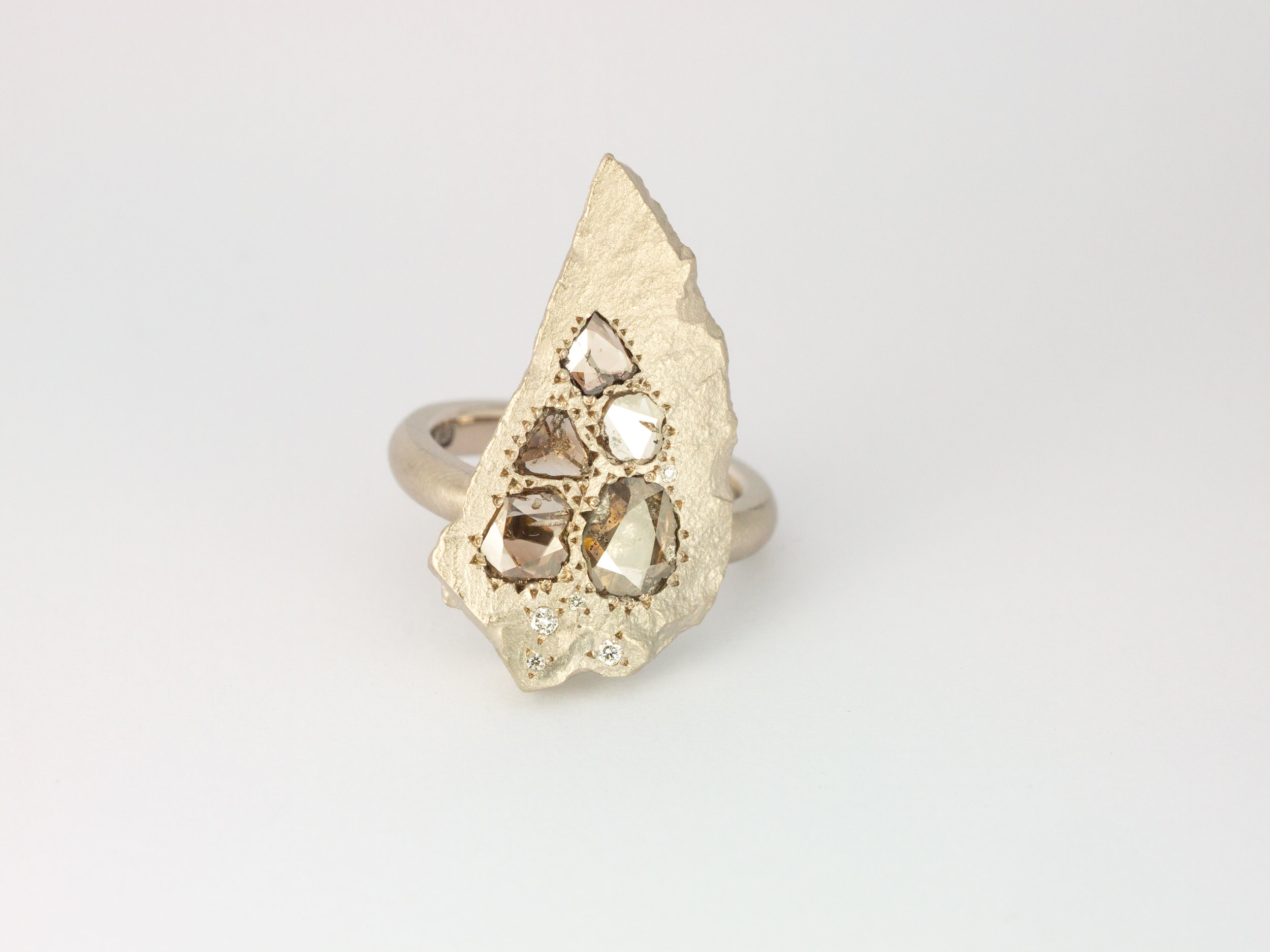  White gold rock engagement ring with rose cut diamonds 