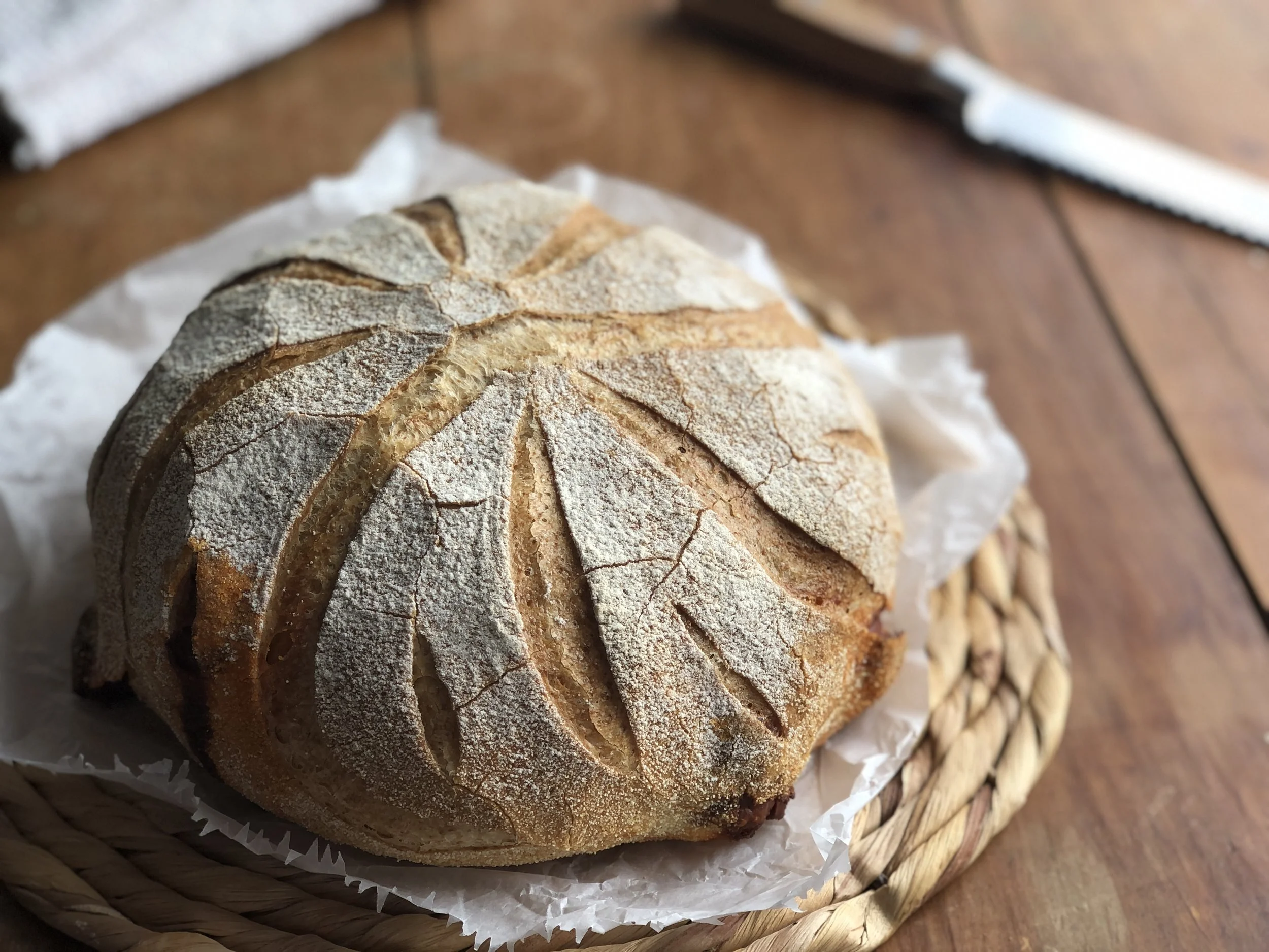 A loaf from a hazy memory and bran coated wholemeal rolls
