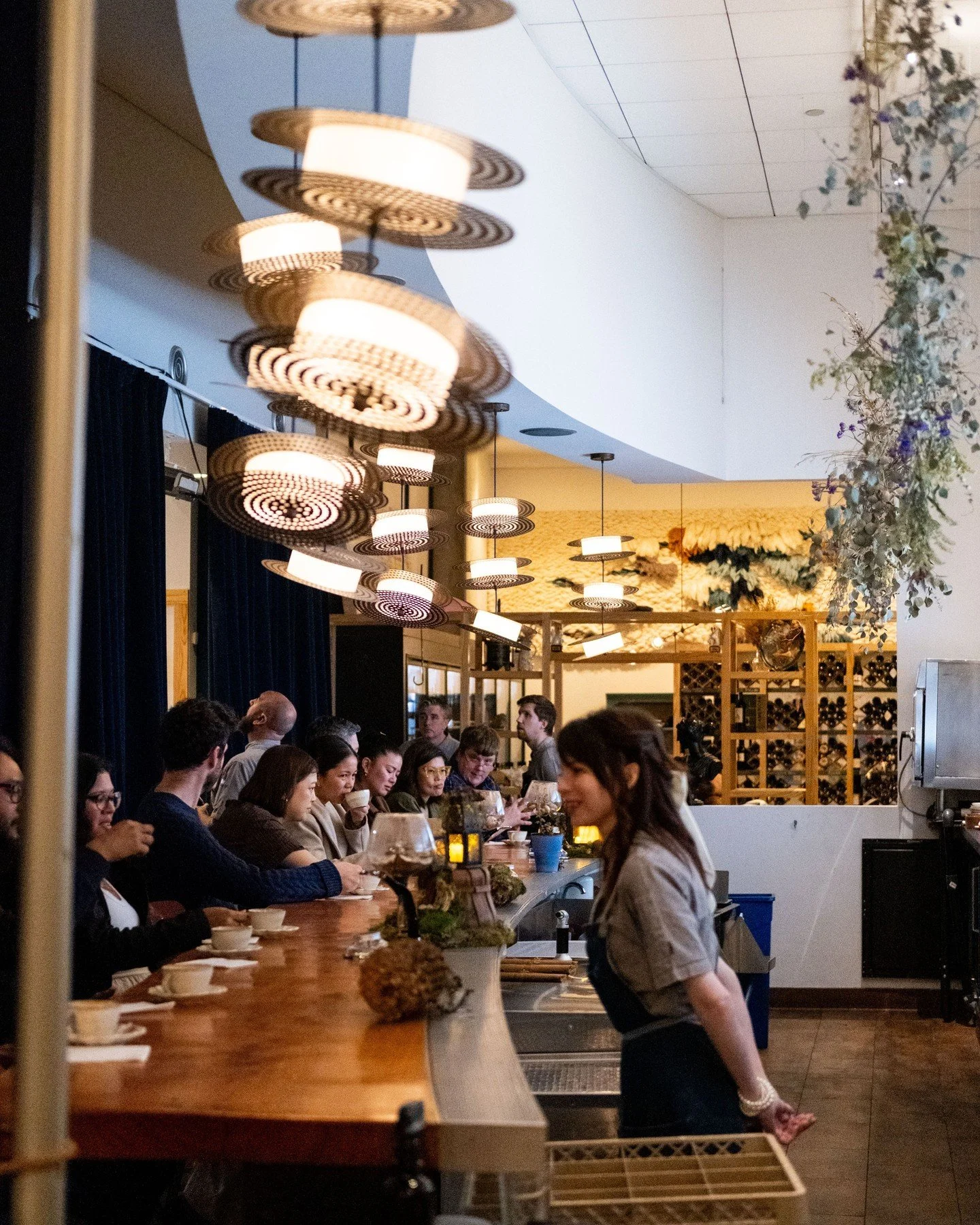 With only 12 seats, each dinner is an intimate experience. We cherish the moments we get to spend with you along the way, gathered in our patio in good weather, seated at the bar in inclement.	

#merchantroots #feastofmosswoods #finedining #conceptme