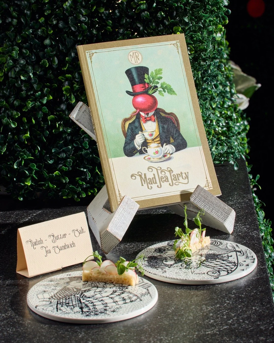 What's tea time without a snack or two to accompany. Enter: radish-butter-salt tea sandwiches...and a dash of madness.	

#merchantroots #cookbooklet #madteaparty #teasandwich #conceptdining