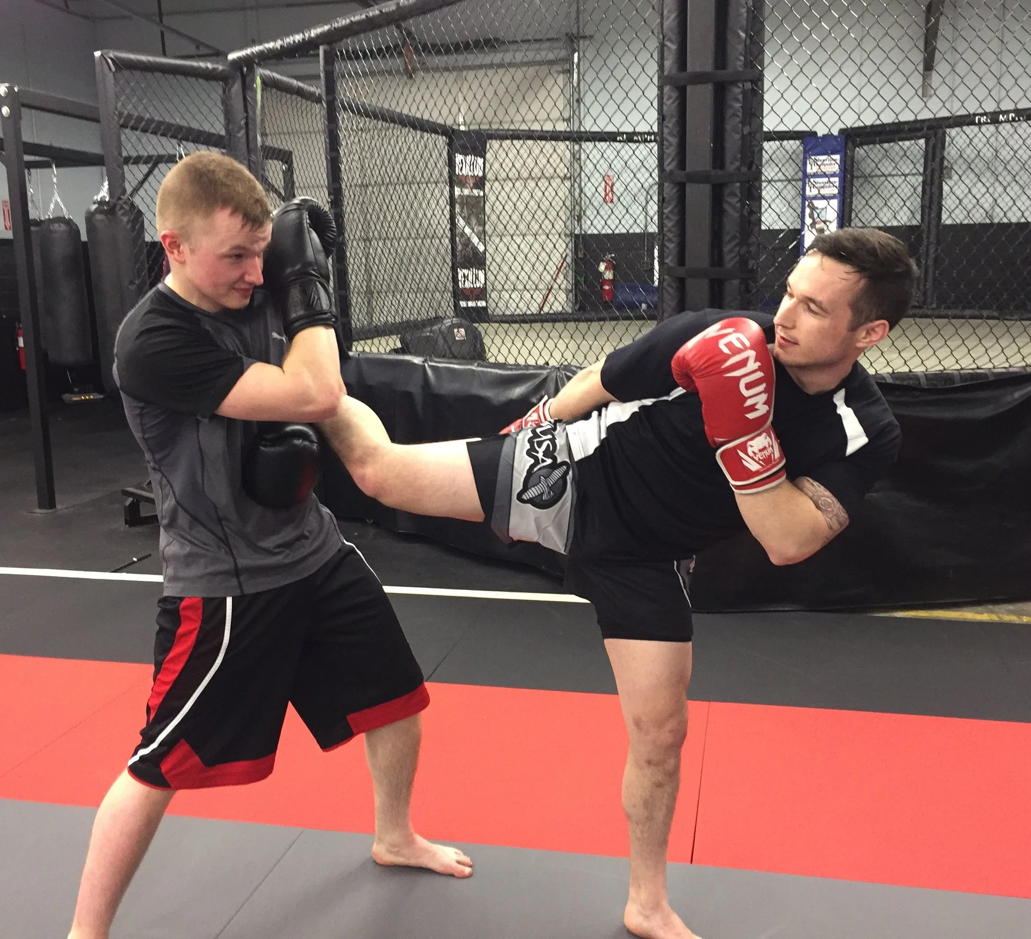 Students drill in Muay Thai class.