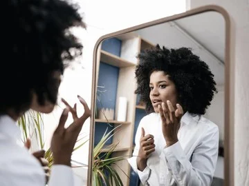 woman-looking-in-mirror.jpg