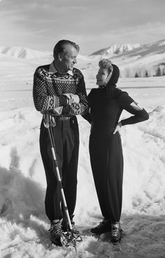 Claudette Colbert and Gary Cooper chat on the slopes of Sun Valley in the early.jpg