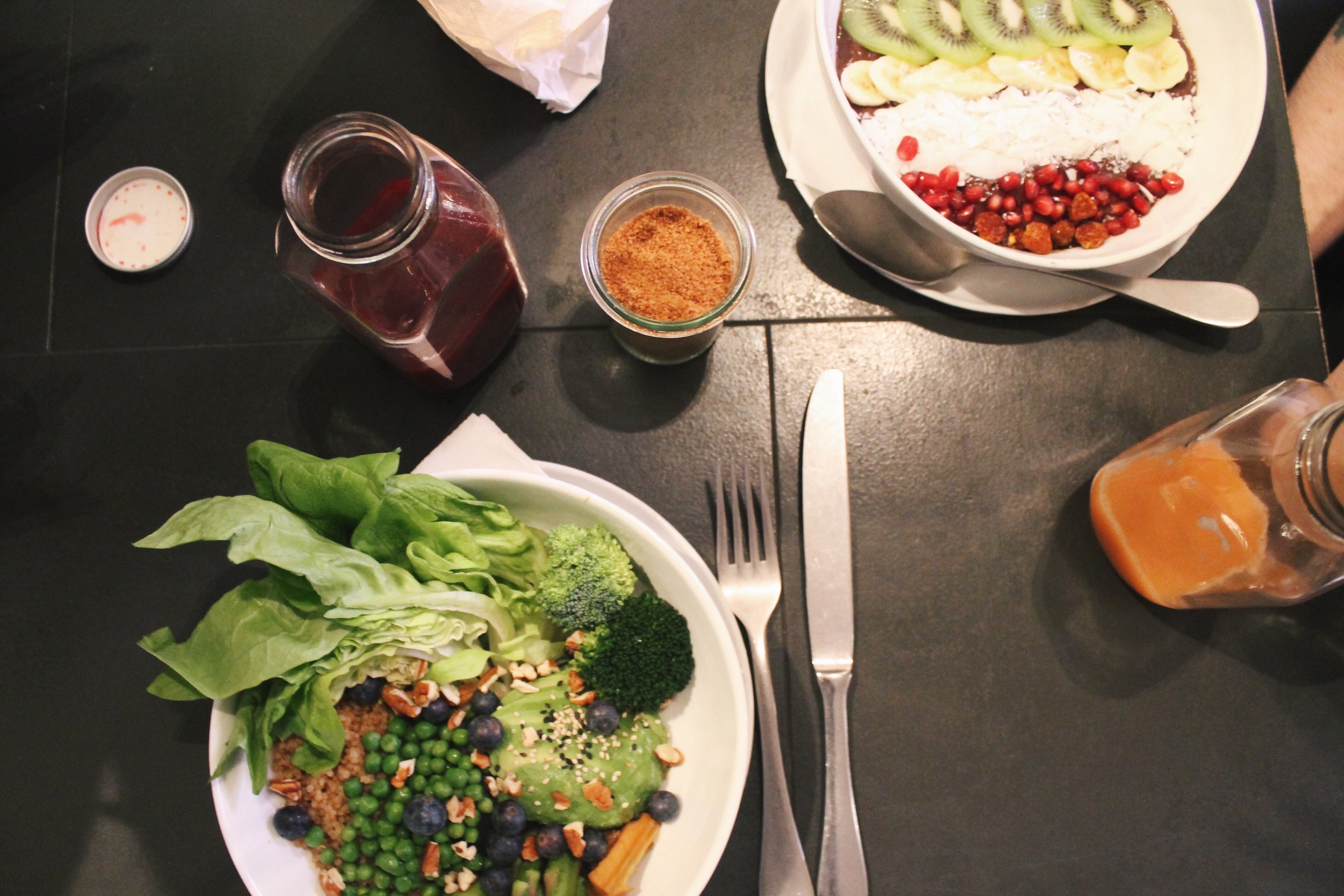 Coal + the Greens with an Acai Bowl on the right