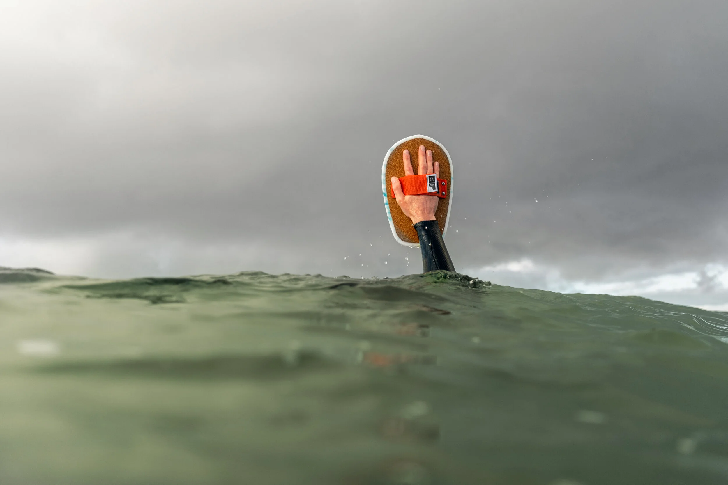 WastetoWaves hand in water LS.jpg