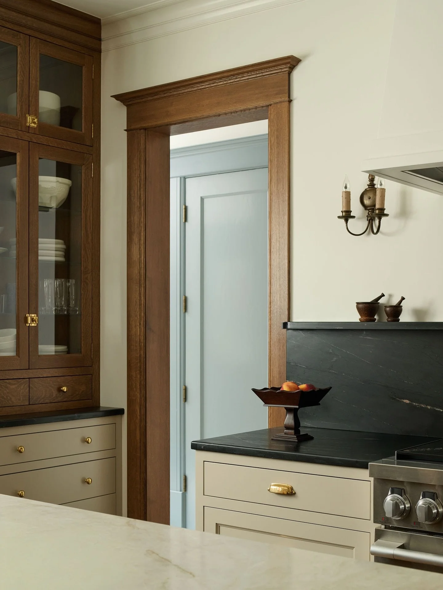 A bright back entry just off the kitchen.⁠
⁠
Soft blue cabinetry meets honed checkerboard tile, turning overflow storage into a design moment.⁠
⁠
View more of the Hermitage Residence with the link in our bio.⁠
⁠
Interior Design: @chicagocommon⁠
Archi