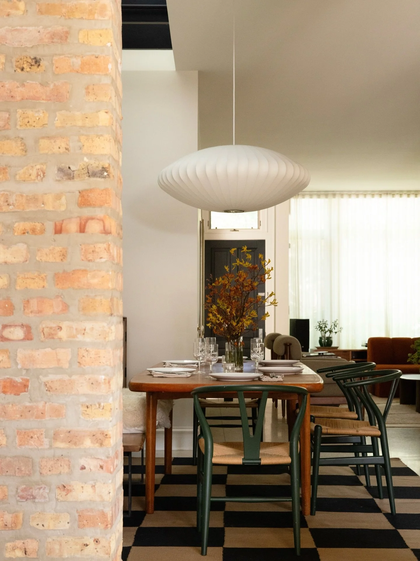 Setting the groove.⁠
⁠
Once marked by disjointed architecture, the Wolcott Residence now moves in harmony through texture and material. The custom dry bar, with walnut shelving and a viola marble backsplash, stands out as a defining feature of the sp