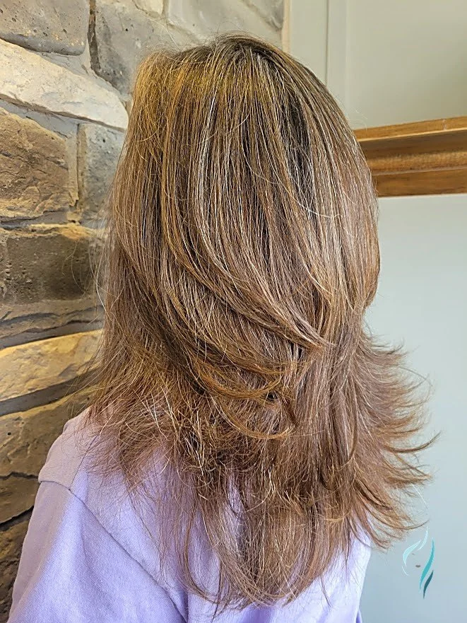 Dimensional brown and blonde highlights with layered cut by Changing Times Hair Designs, State College, PA.