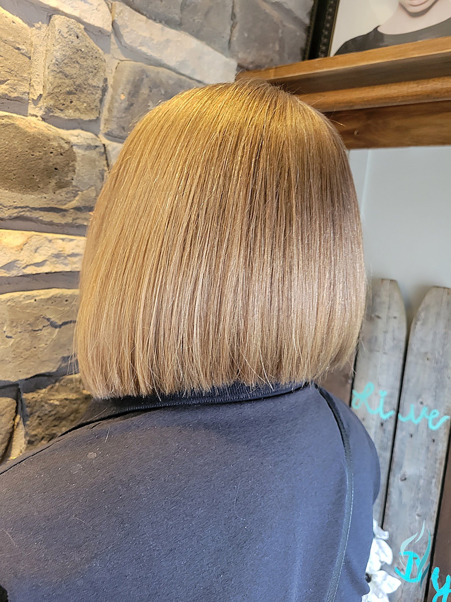 A sleek, buttery blonde blunt bob haircut at Changing Times Hair Designs, State College, PA.