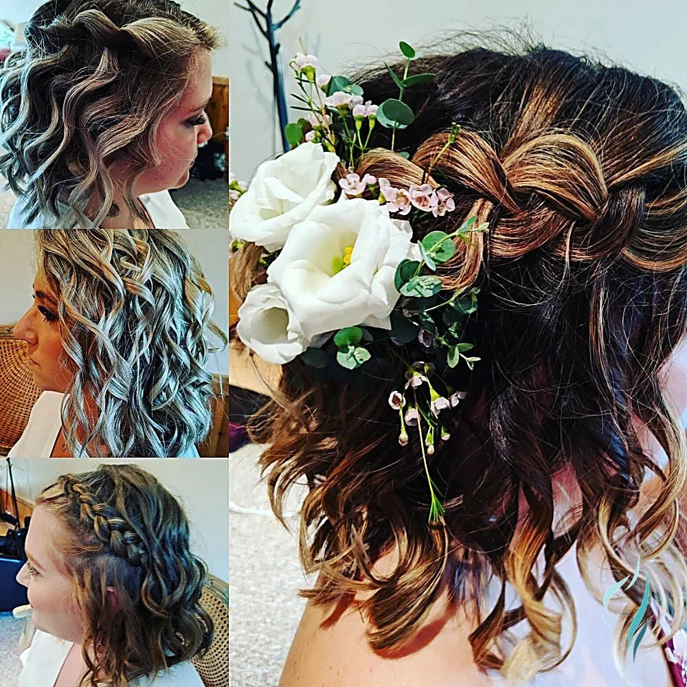 Curled hair, braided detailing, and floral accents by Changing Times Hair Designs, State College, PA.