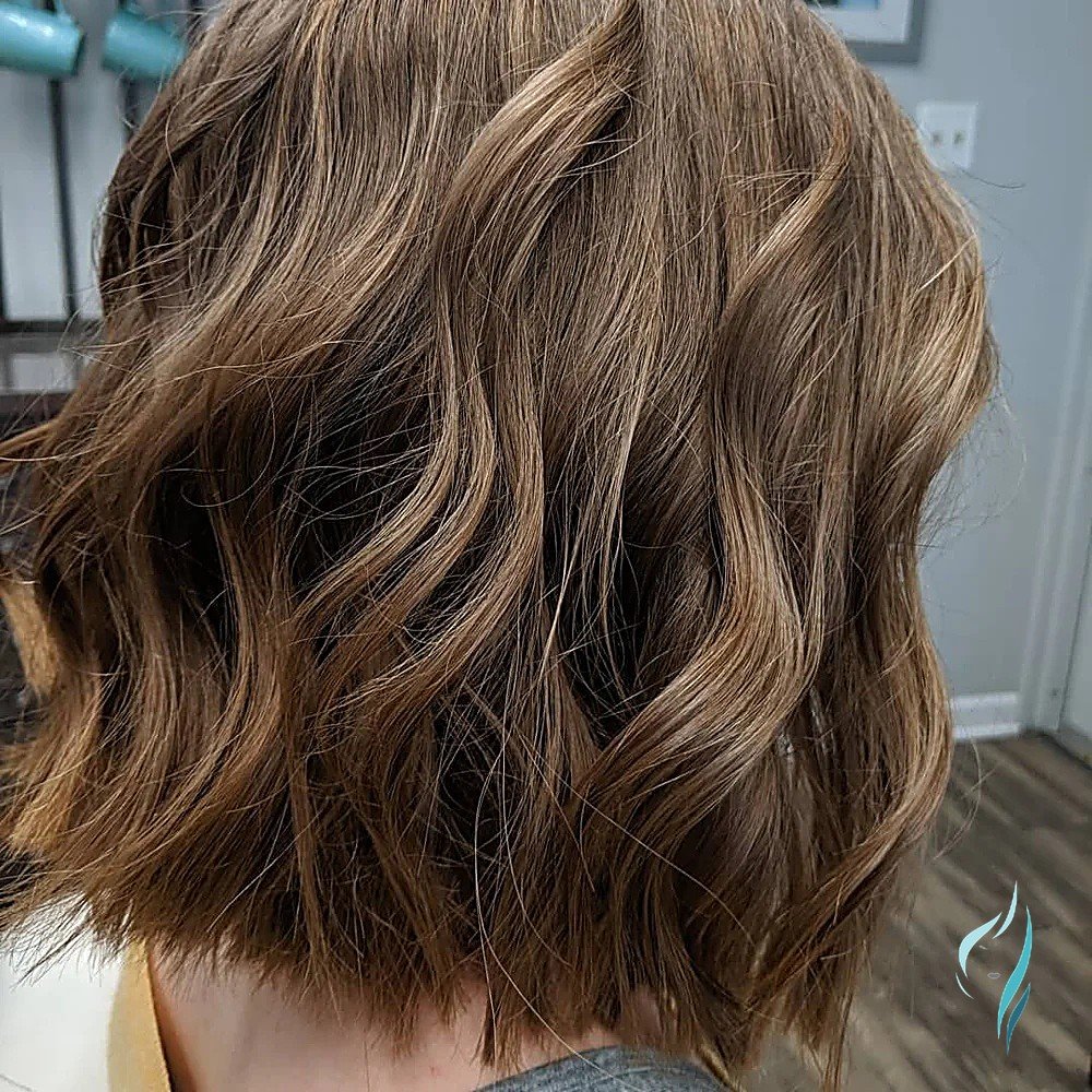 Dimensional light brown wavy bob by Changing Times Hair Designs, State College, PA.