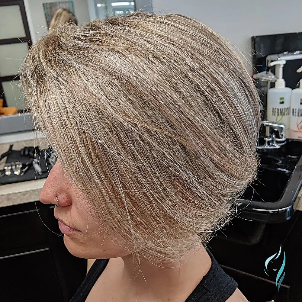 Dimensional blonde bob haircut at Changing Times Hair Designs, State College, PA.