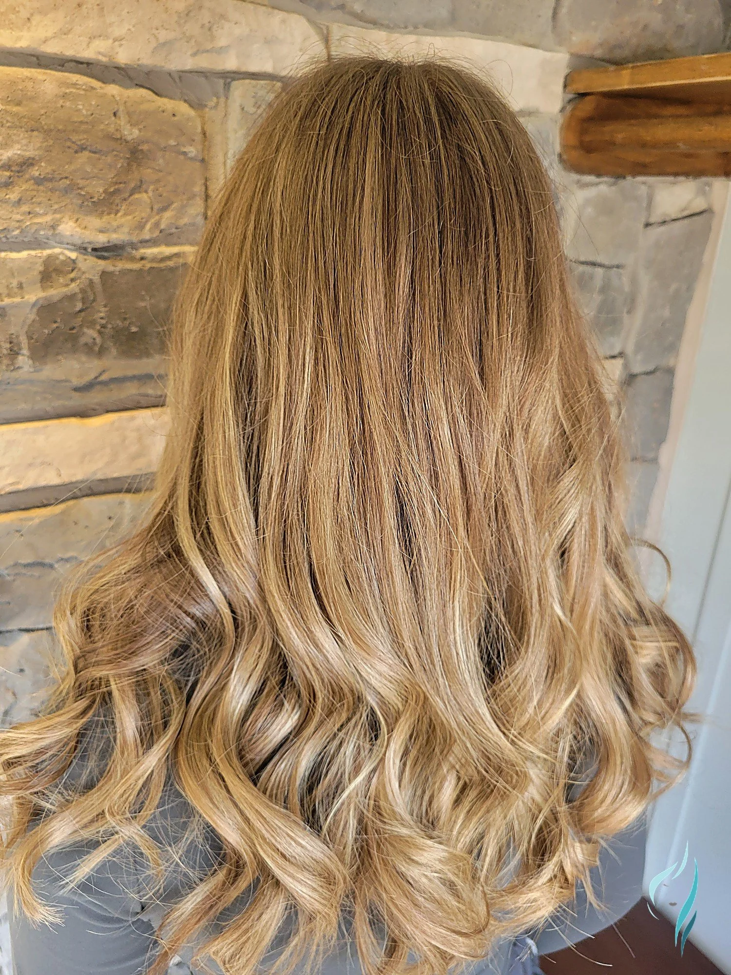 Dimensional golden blonde balayage hair by Changing Times Hair Designs, State College, PA.