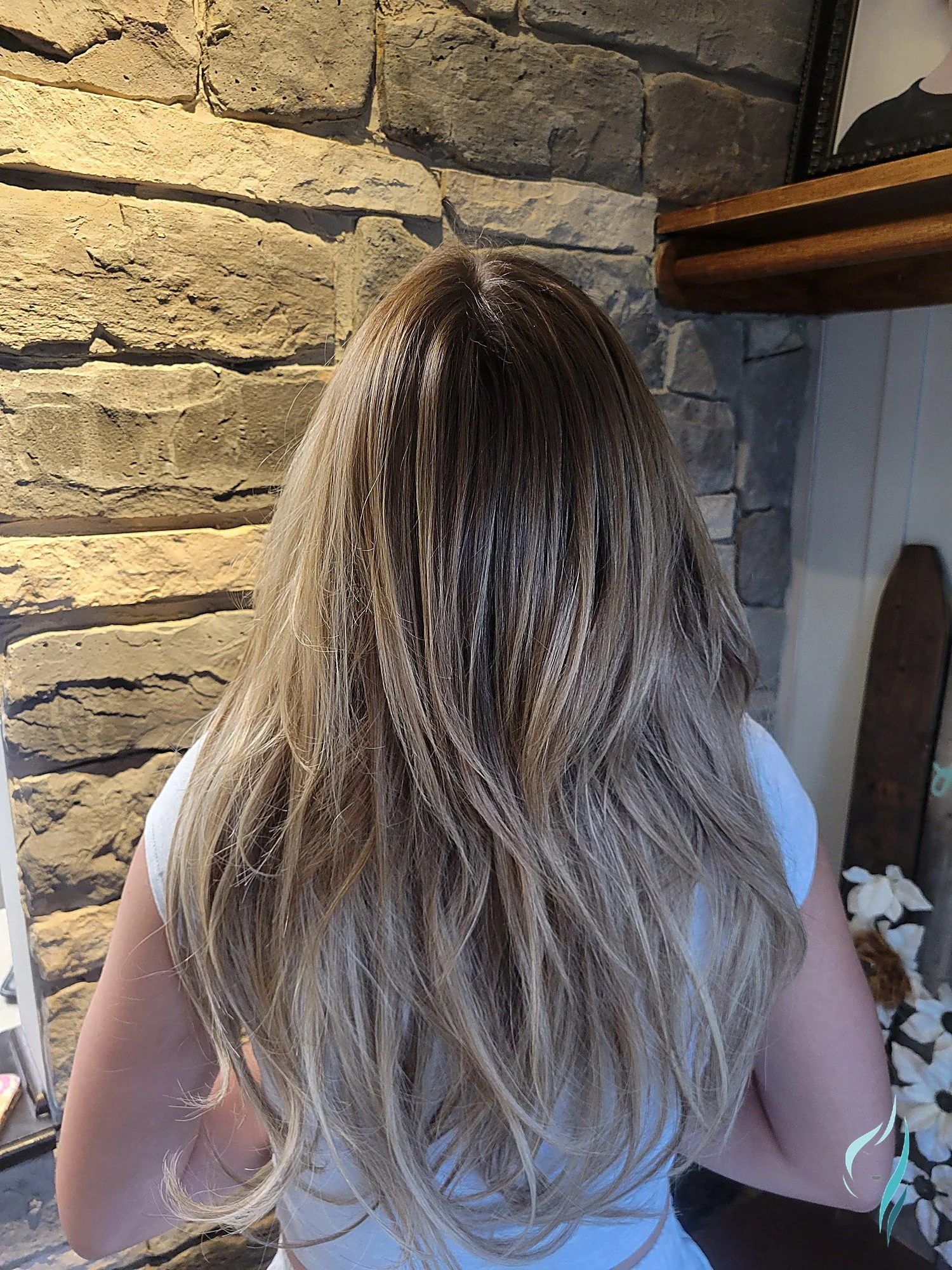 Dimensional lived-in blonde hair color at Changing Times Hair Designs, State College, PA.