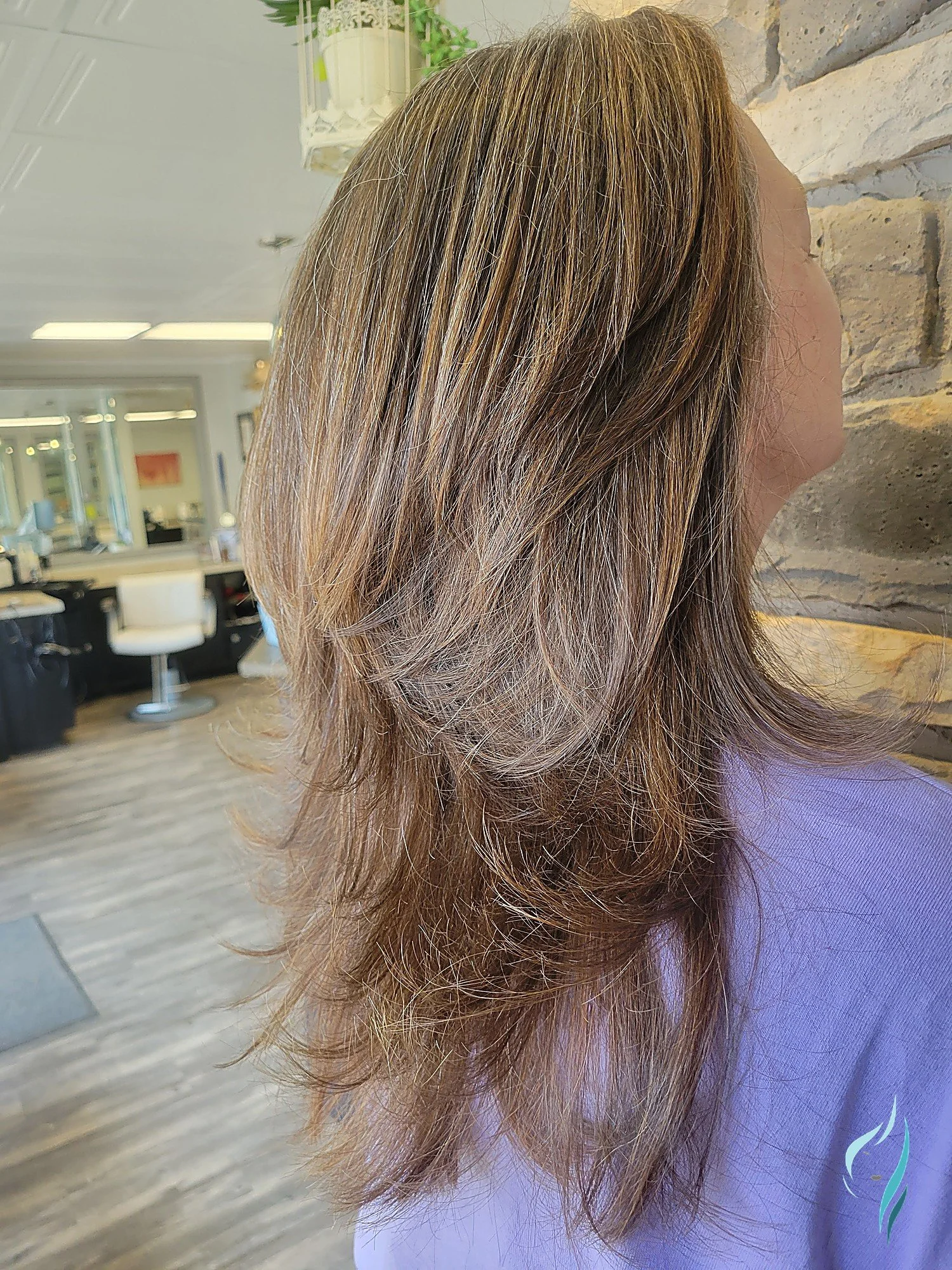 Dimensional highlights and layered haircut by Changing Times Hair Designs, State College, PA.