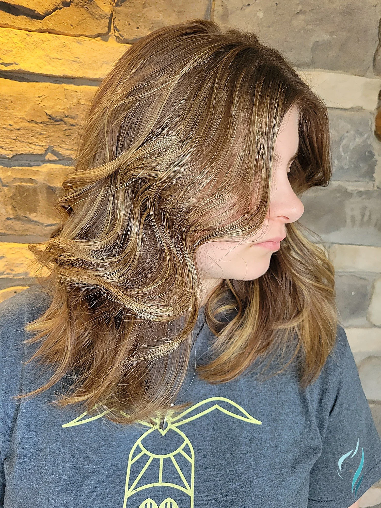 Dimensional honey highlights and soft layered cut by Changing Times Hair Designs, State College, PA.