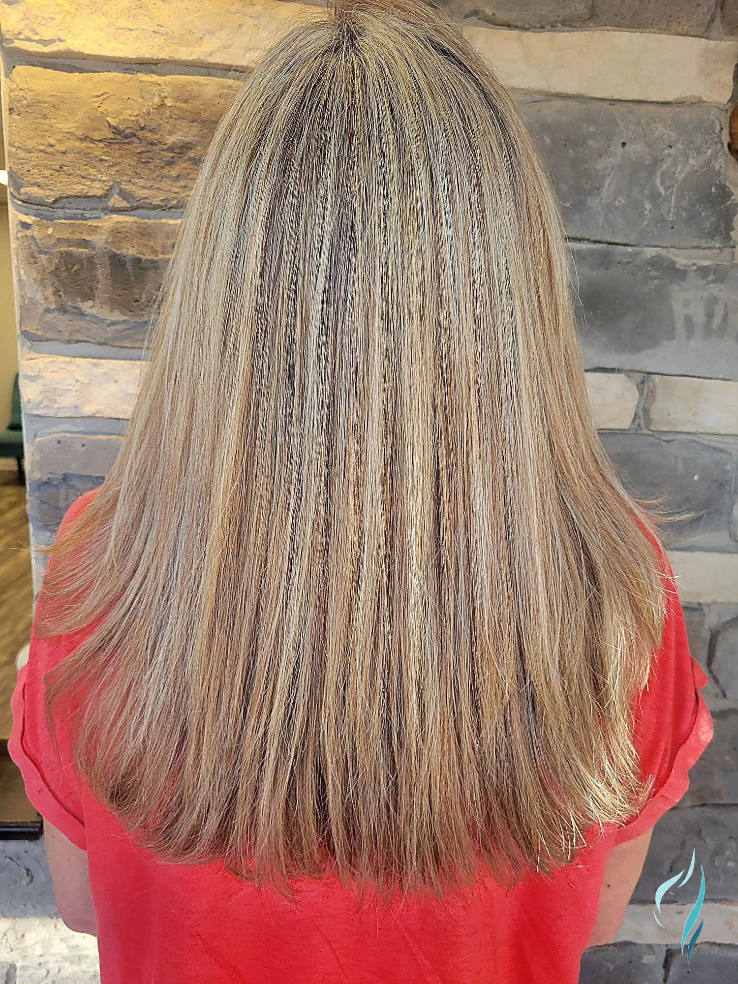 Blonde hair with dimensional highlights at Changing Times Hair Designs, State College, PA.