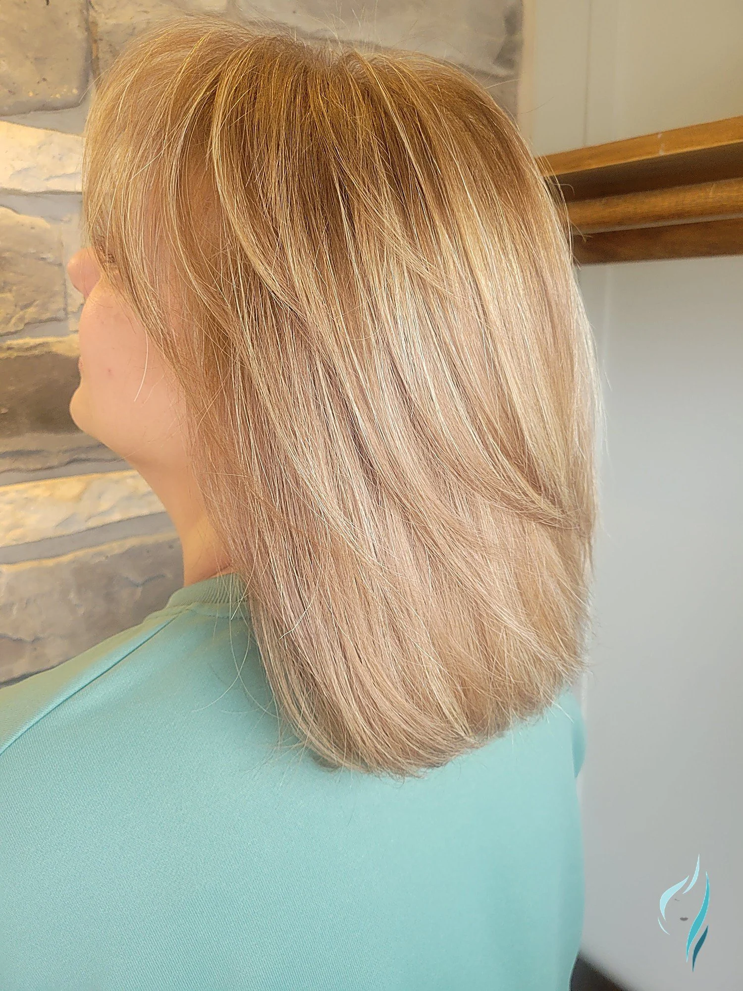 Sophisticated golden blonde shoulder length cut by Changing Times Hair Designs, State College, PA.