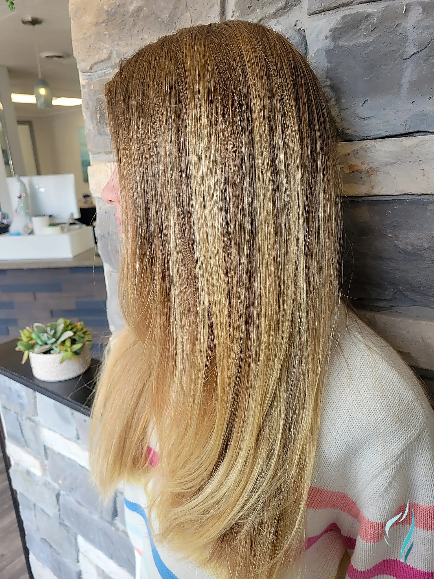Honey blonde dimensional highlights on straight hair by Changing Times Hair Designs, State College, PA.