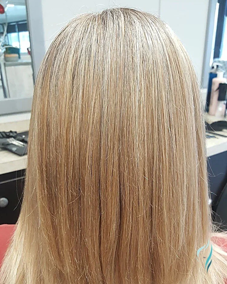 Dimensional blonde highlights by Changing Times Hair Designs, State College, PA.