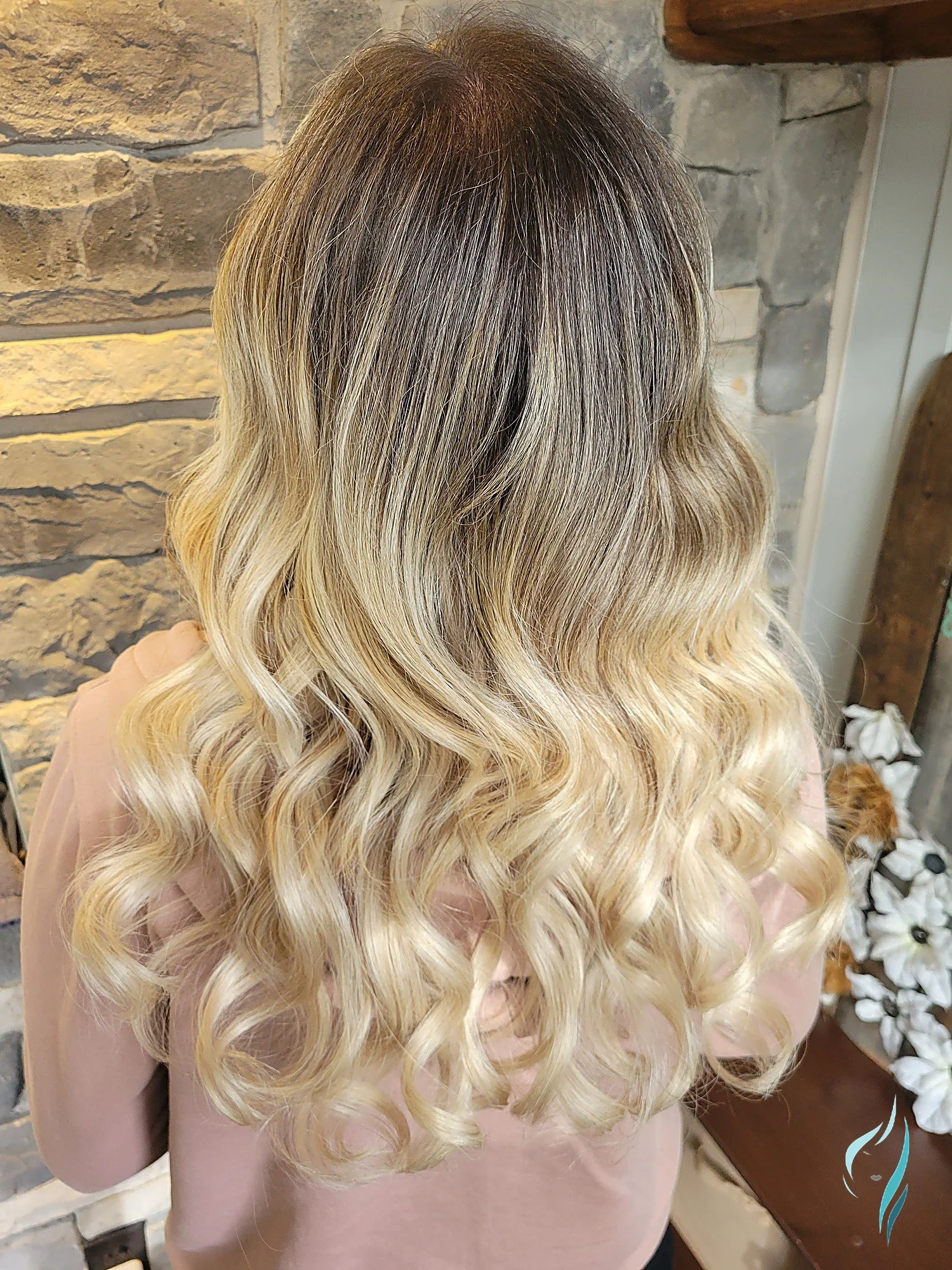 Dimensional blonde balayage with a soft root melt by Changing Times Hair Designs, State College, PA.