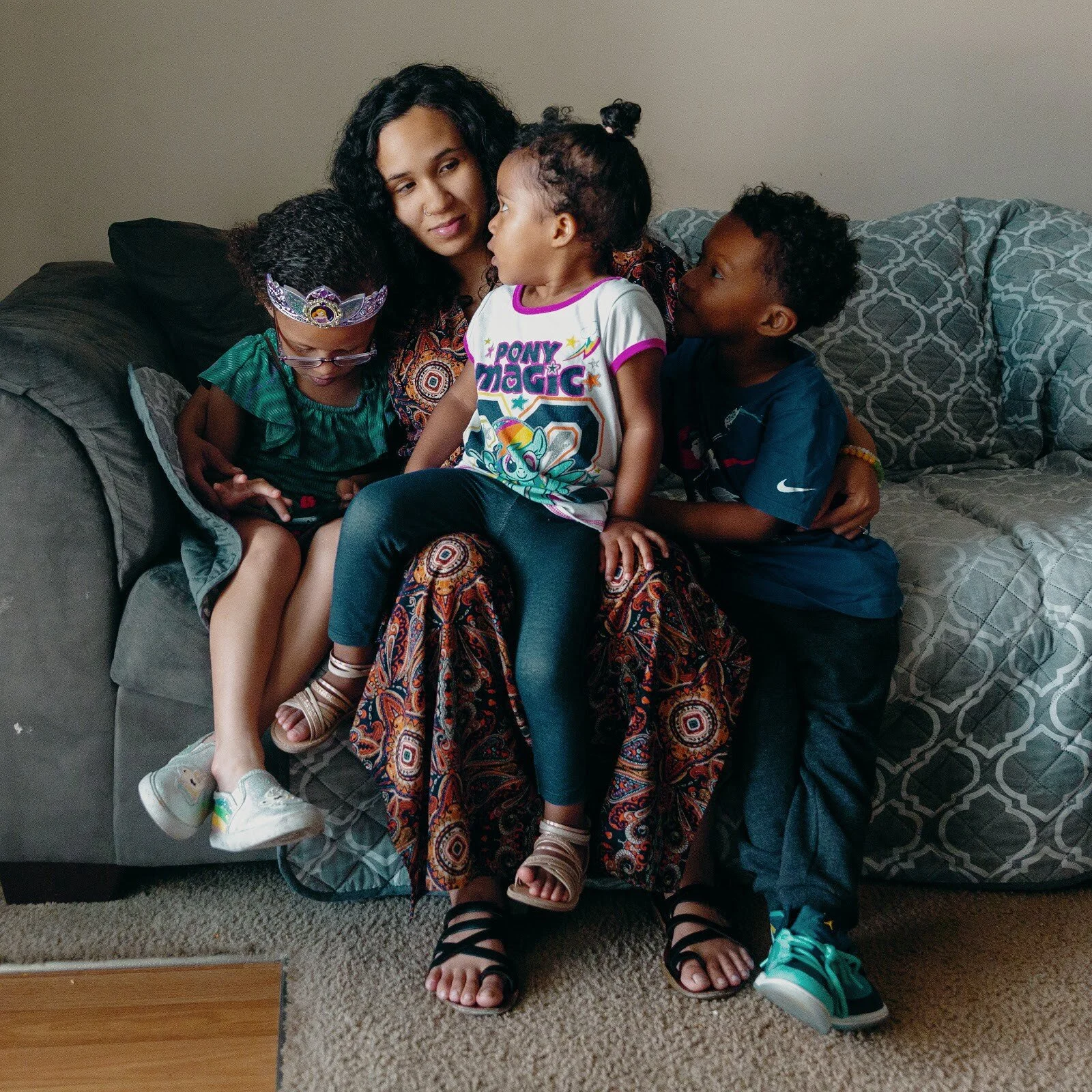 Brianna Moore and her kids at home in Mobile, Alabama.