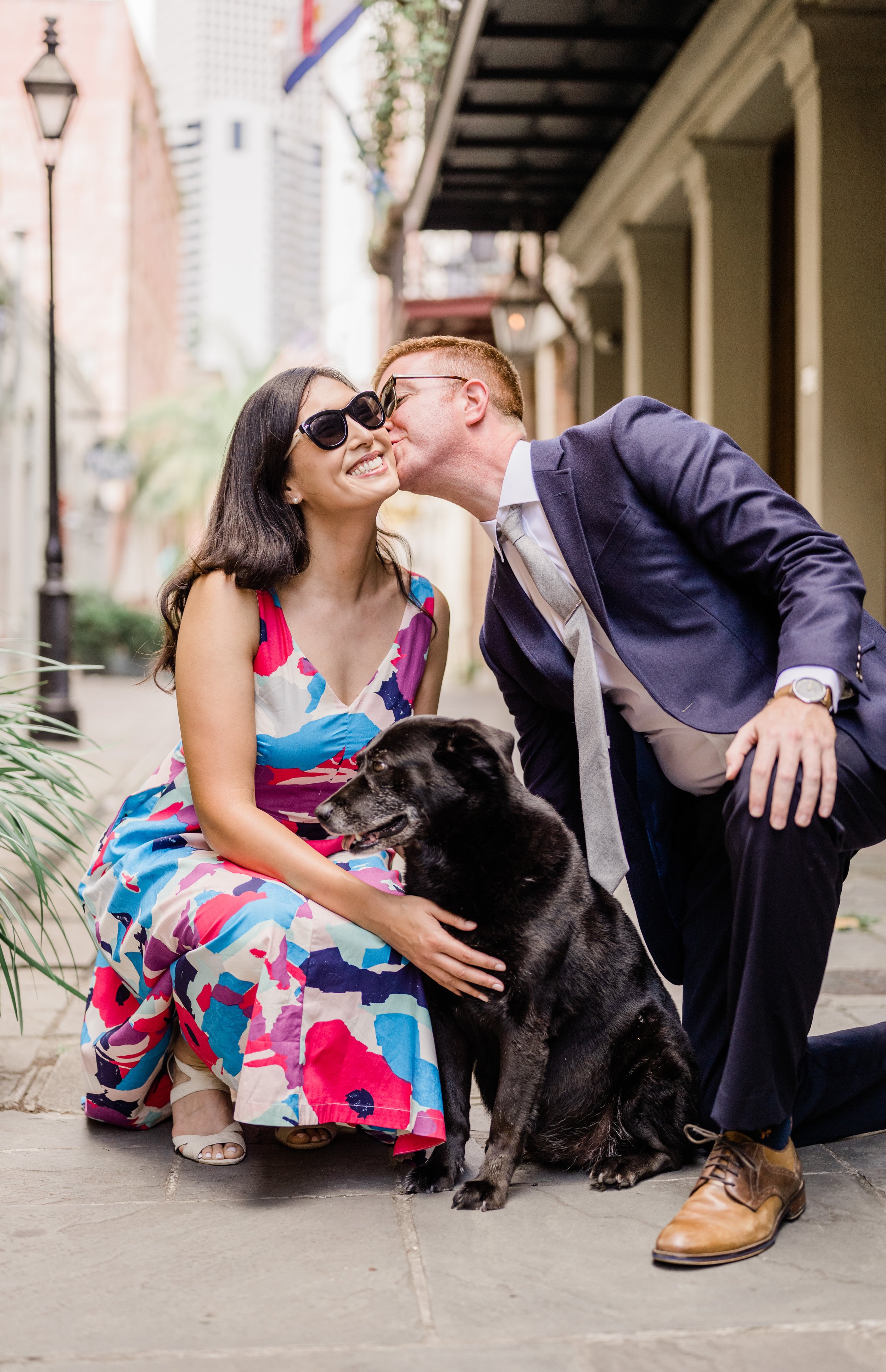  A couple celebrates their engagement with photos around the French Quarter beloved pup in tow 