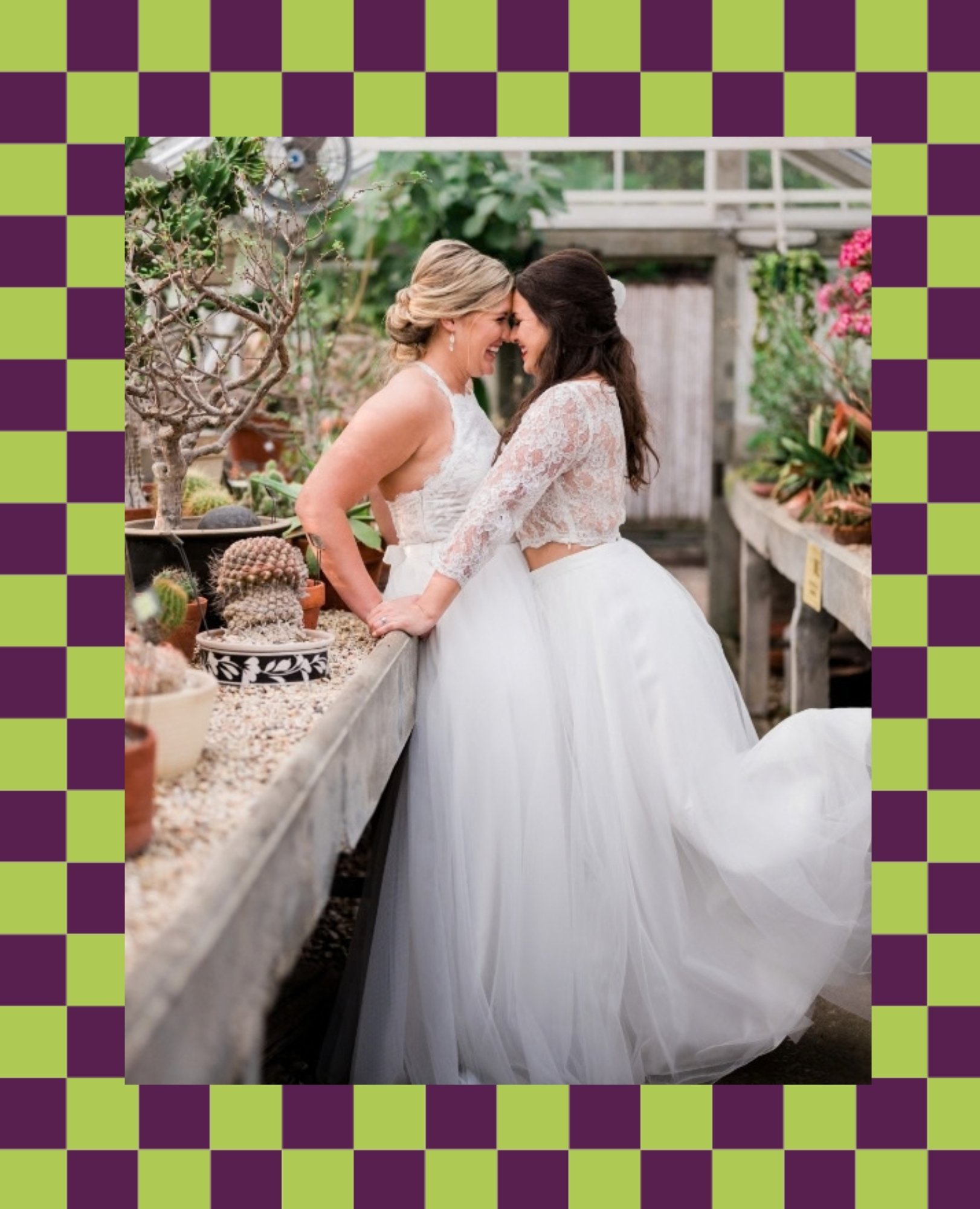 A newlywed couple standing forehead to forehead in a greenhouse as they smile