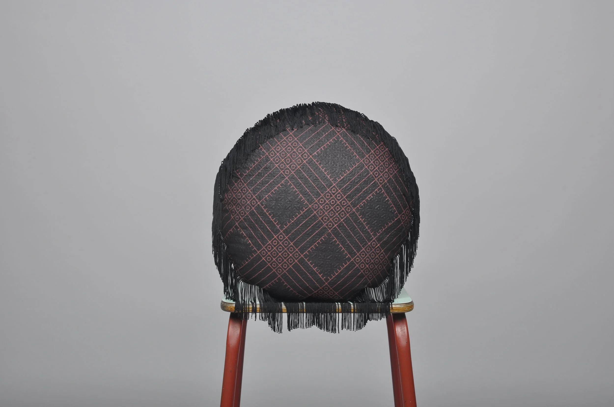 Ecliptic delight : Dark side of the moon tassel tussle