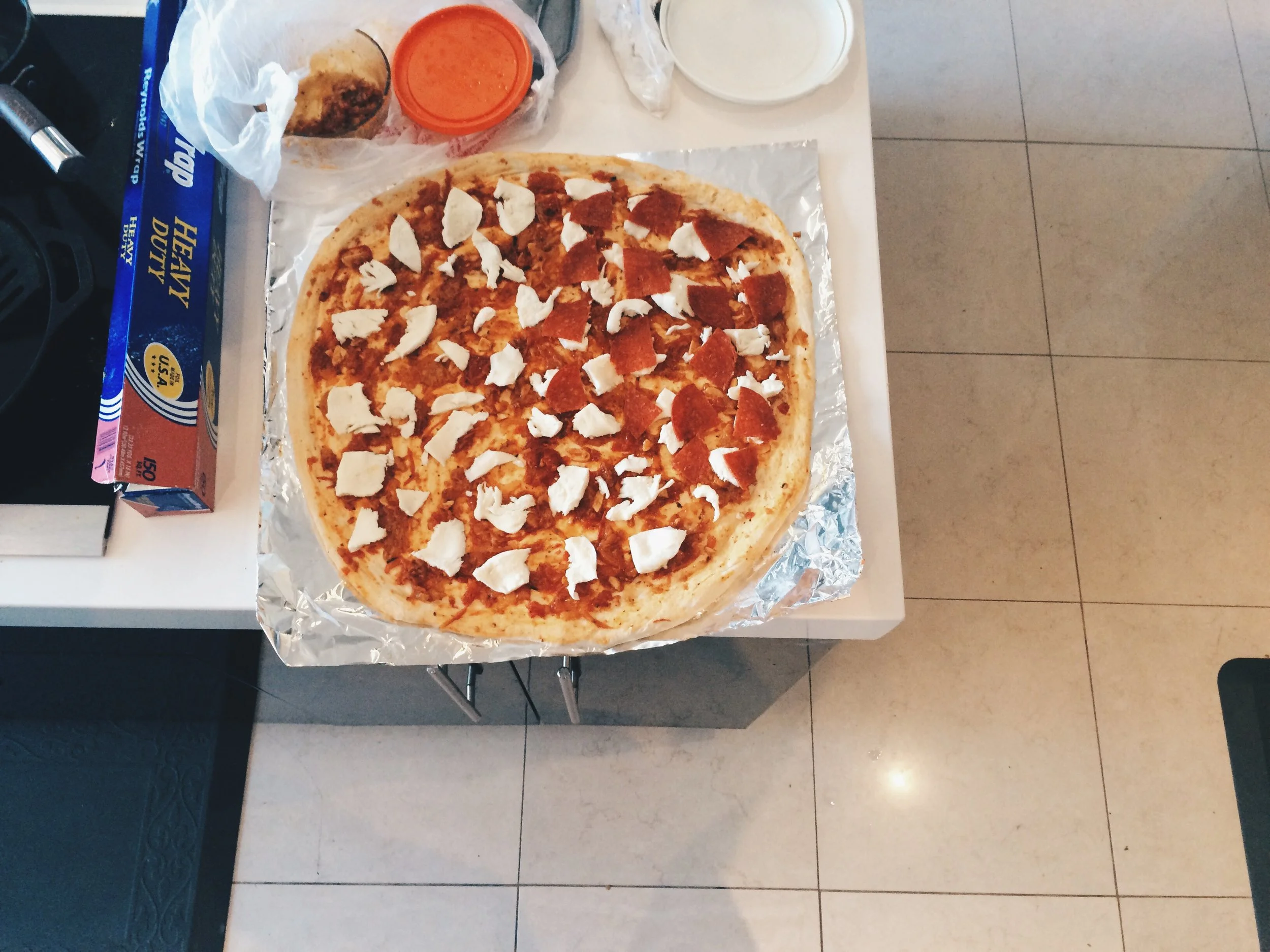 we also made this pizza. well, Emily made it. i watched and made encouraging noises.