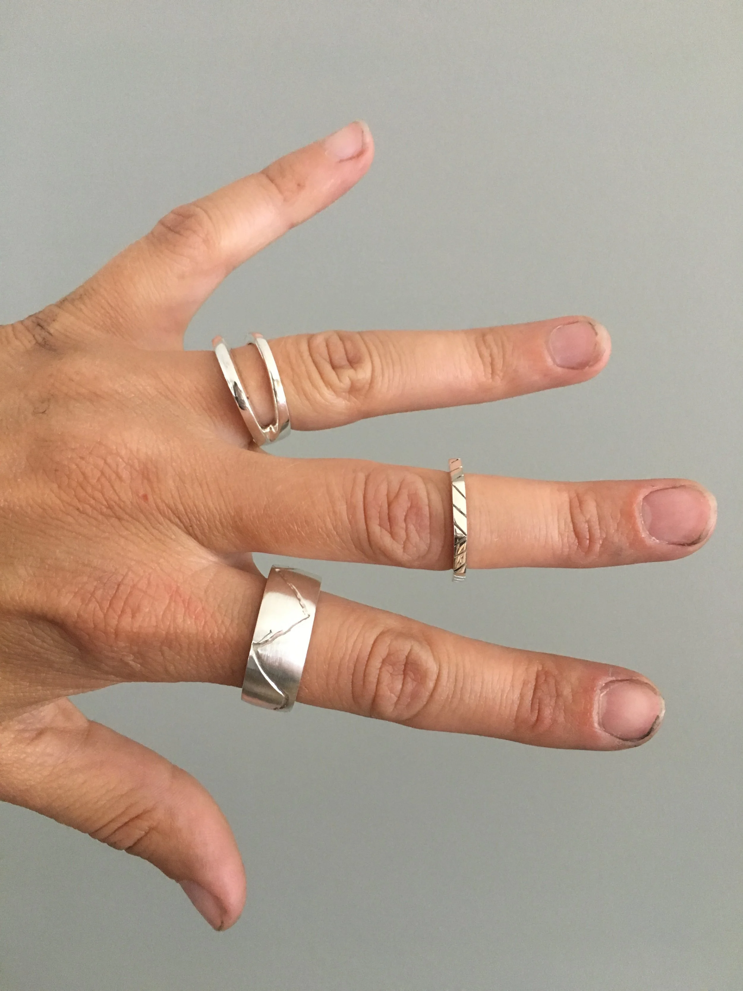 The final product of 3 custom sterling silver rings. 