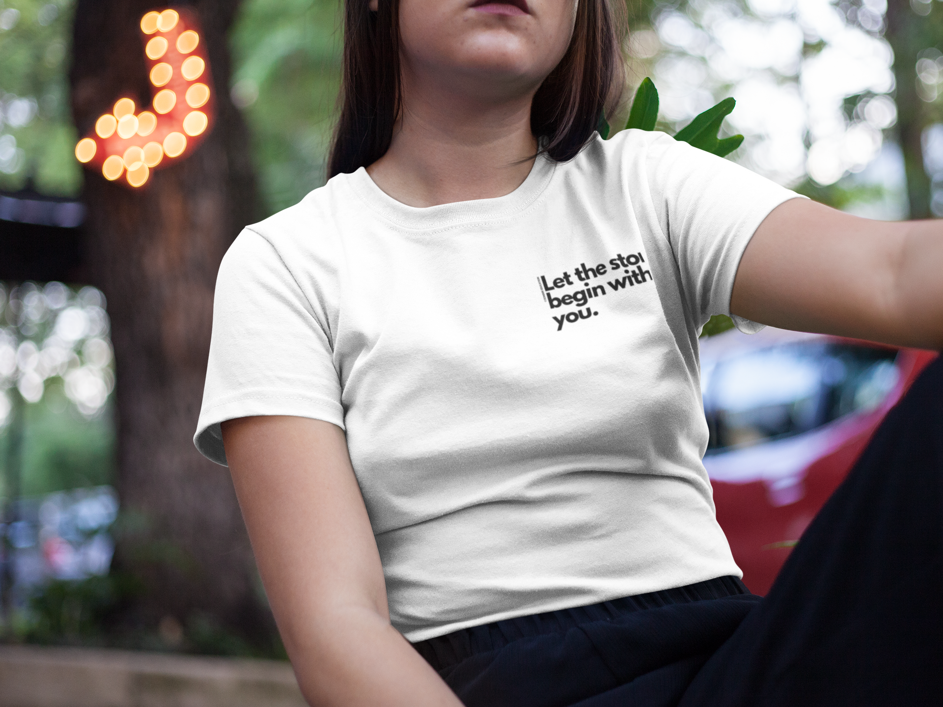 mockup-of-a-cropped-face-asian-girl-wearing-a-round-neck-tee-while-near-trees-a16966.png