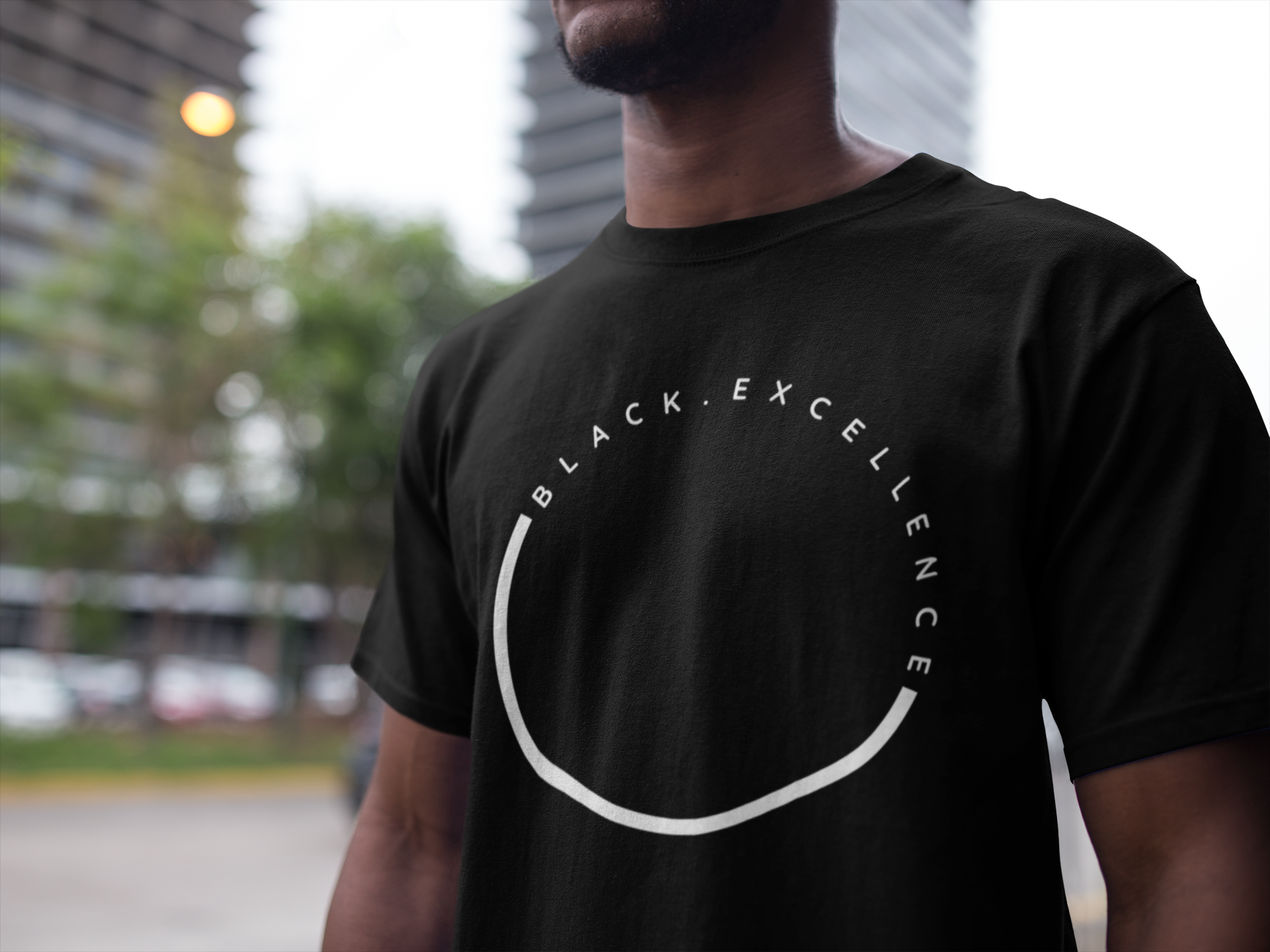 black-man-wearing-a-t-shirt-mockup-at-the-city-a16894.png