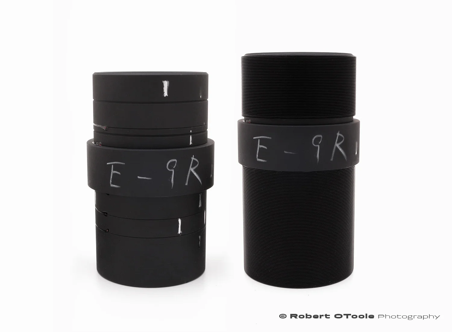 Nikon Scanner Nikkor ED lens with 52mm threaded sleeves installed on the lens barrel.