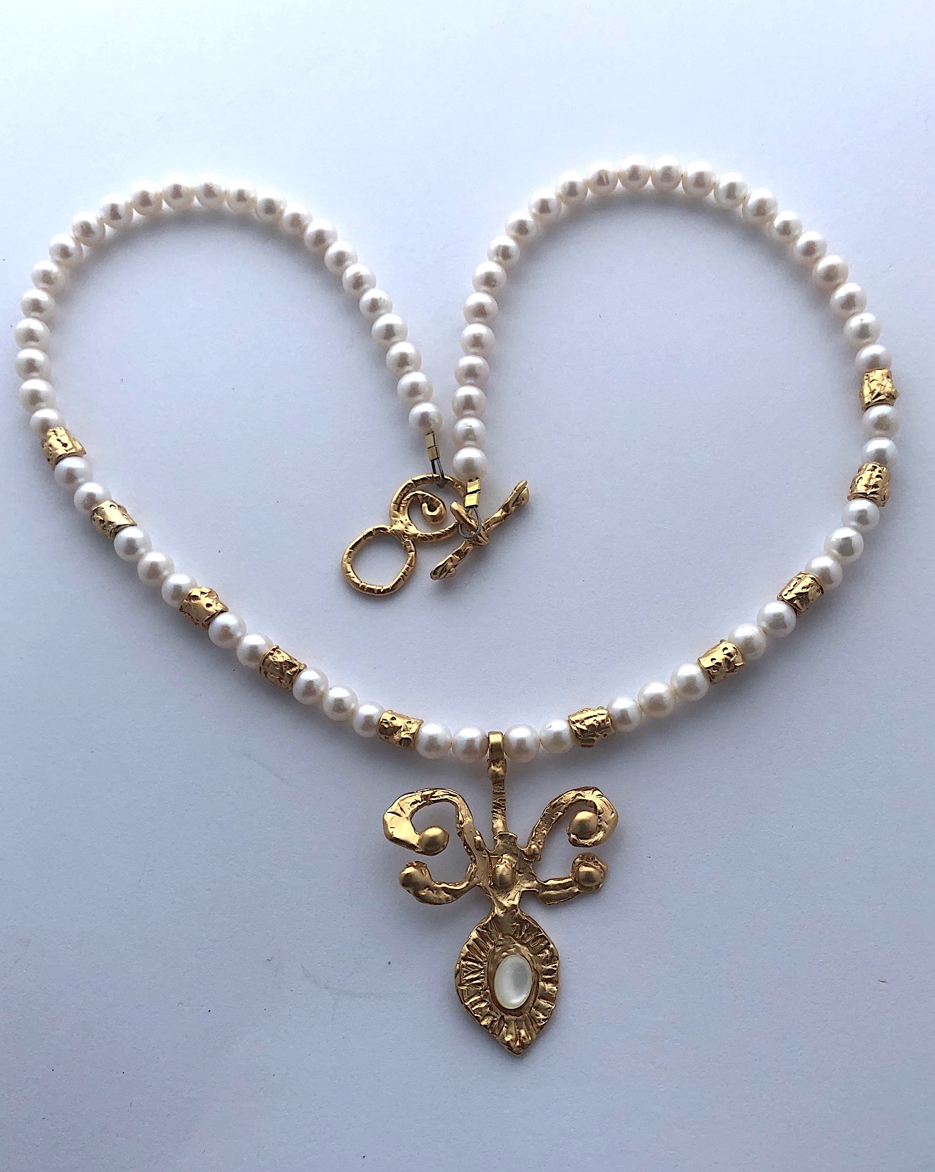 Harmony in pearl and gold.jpeg