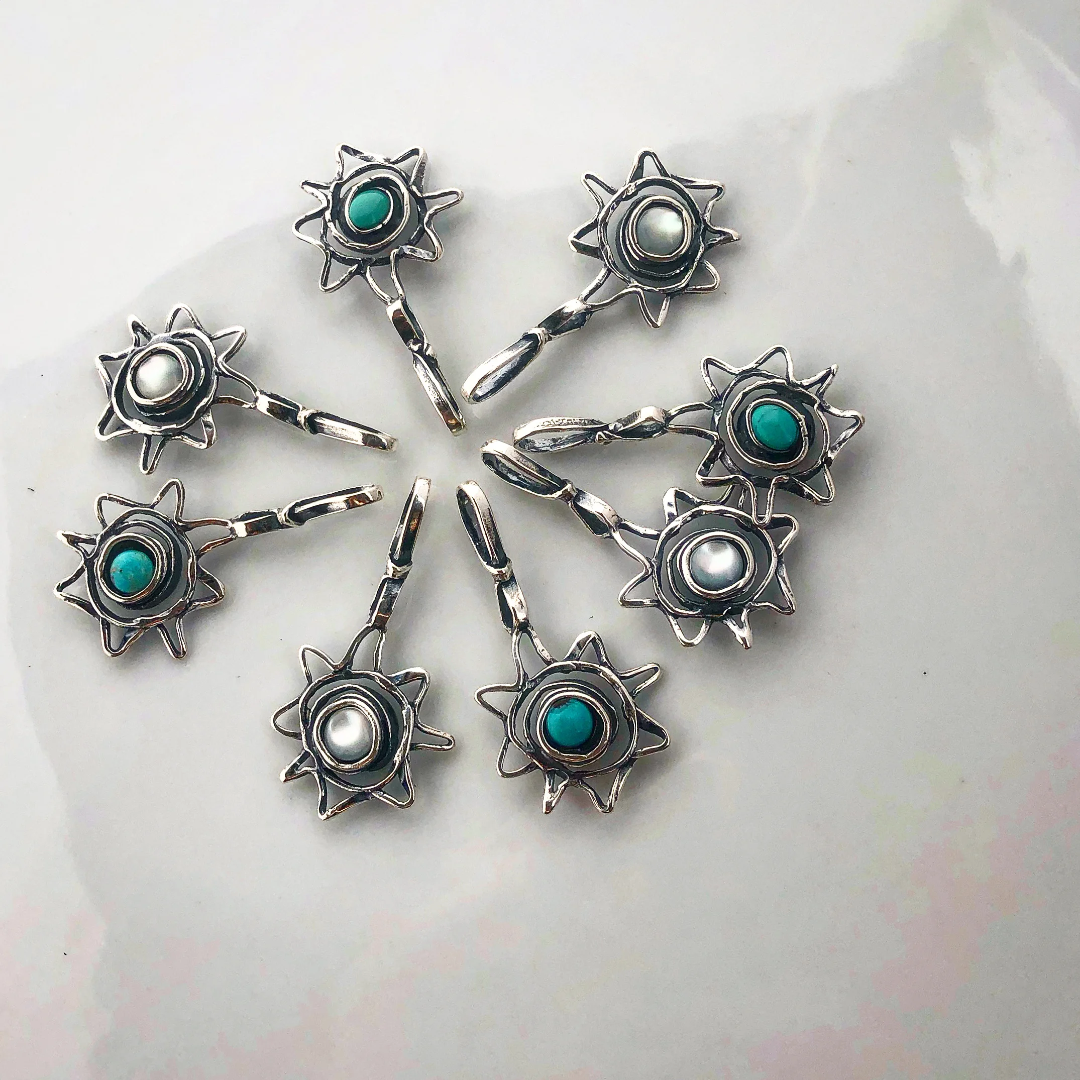 The Optimist Slide ...sterling silver slide ...one side is turquoise and the other mother of pearl