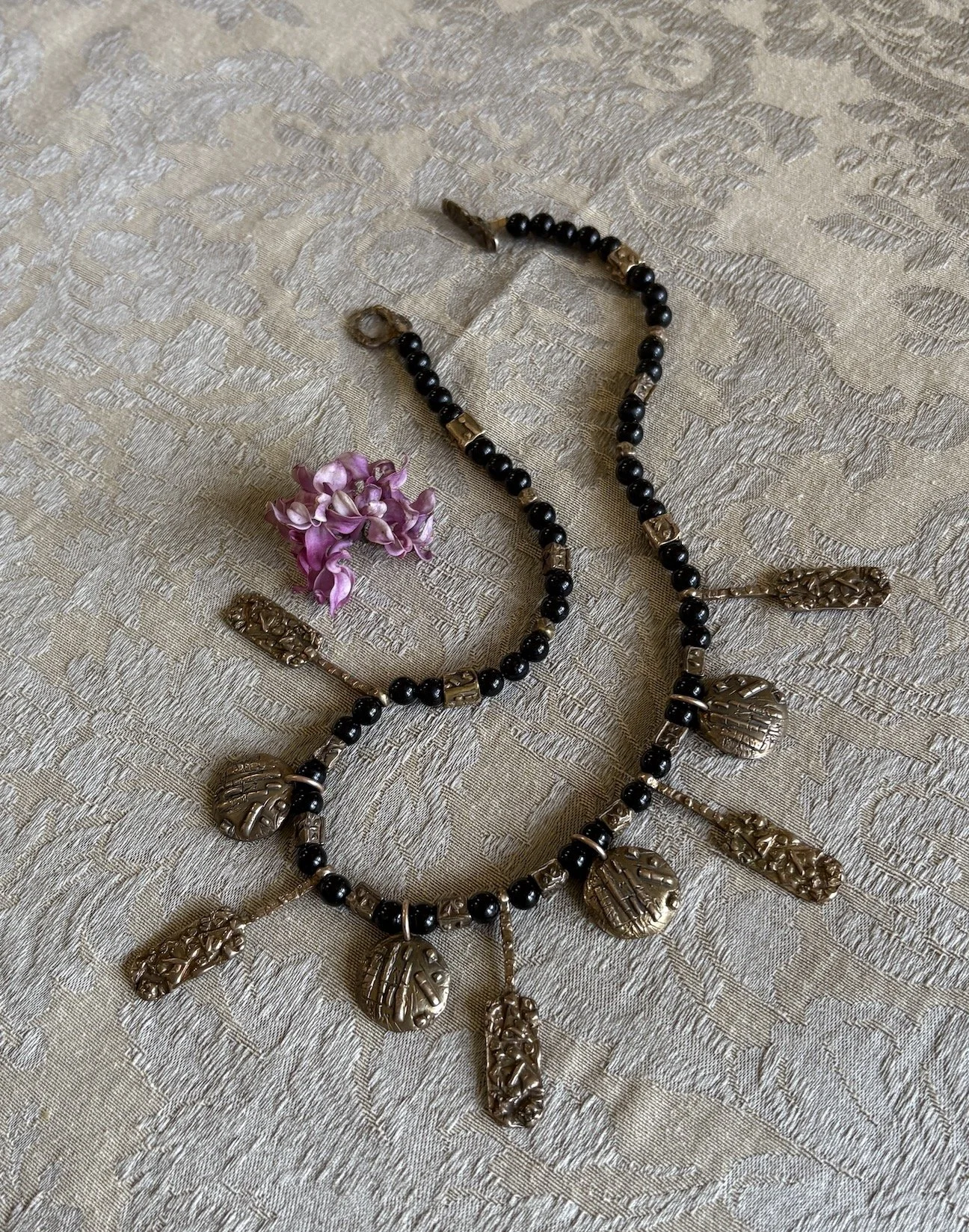 Adventure Plain and Simple ...a Bronze necklace.