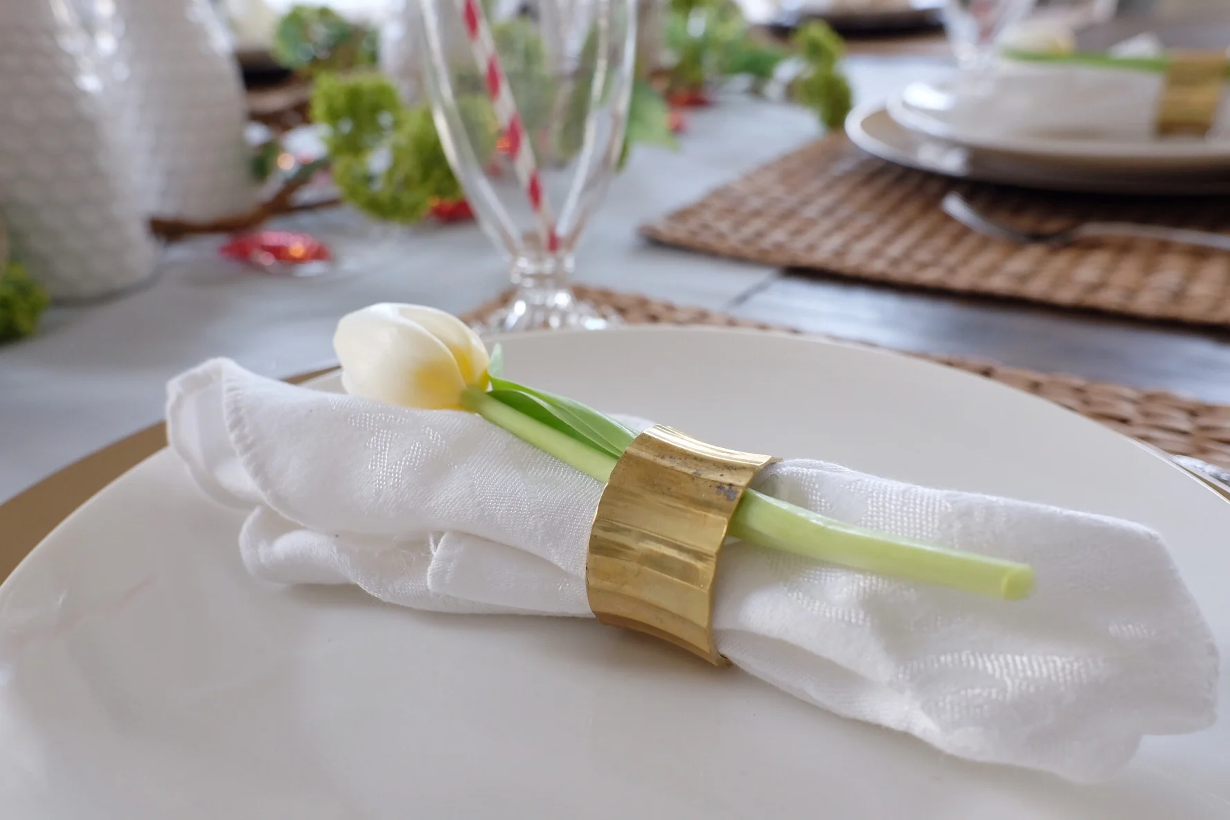 Edges of napkin facing the middle of table.