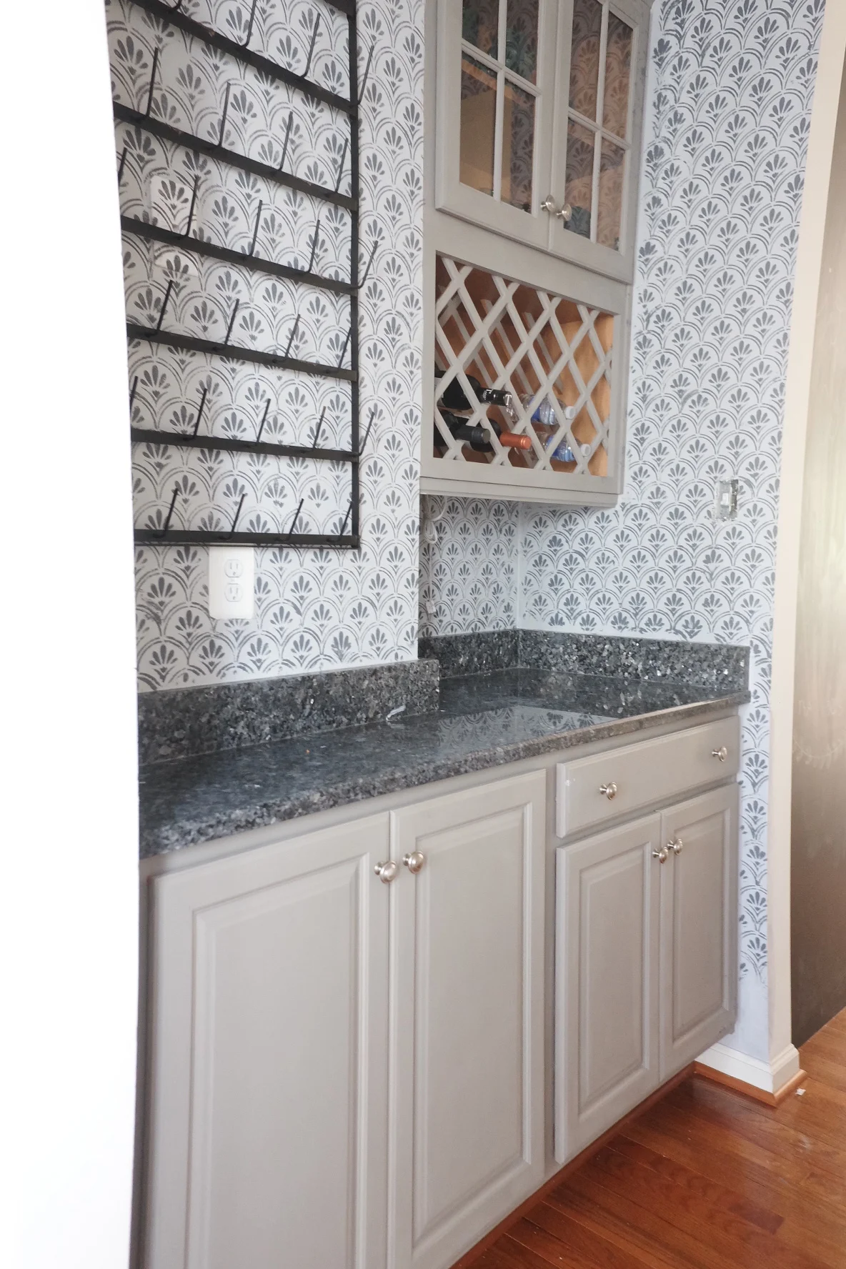 These cabinets were painted in a light gray/taupe color but they just didn't go with my new stencil. 